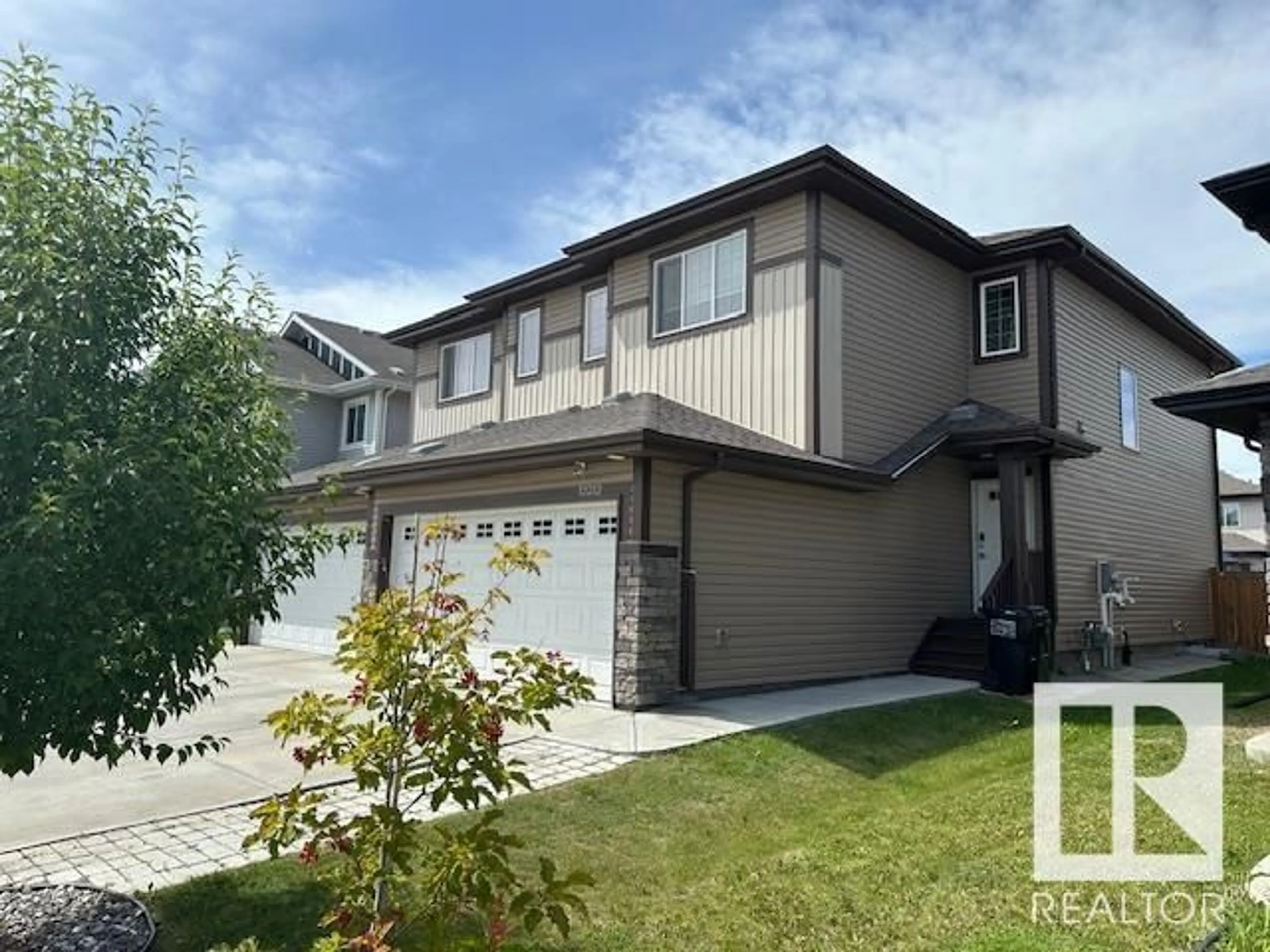Home with vinyl exterior material, street for 12212 176 AV, Edmonton Alberta T5X0L2