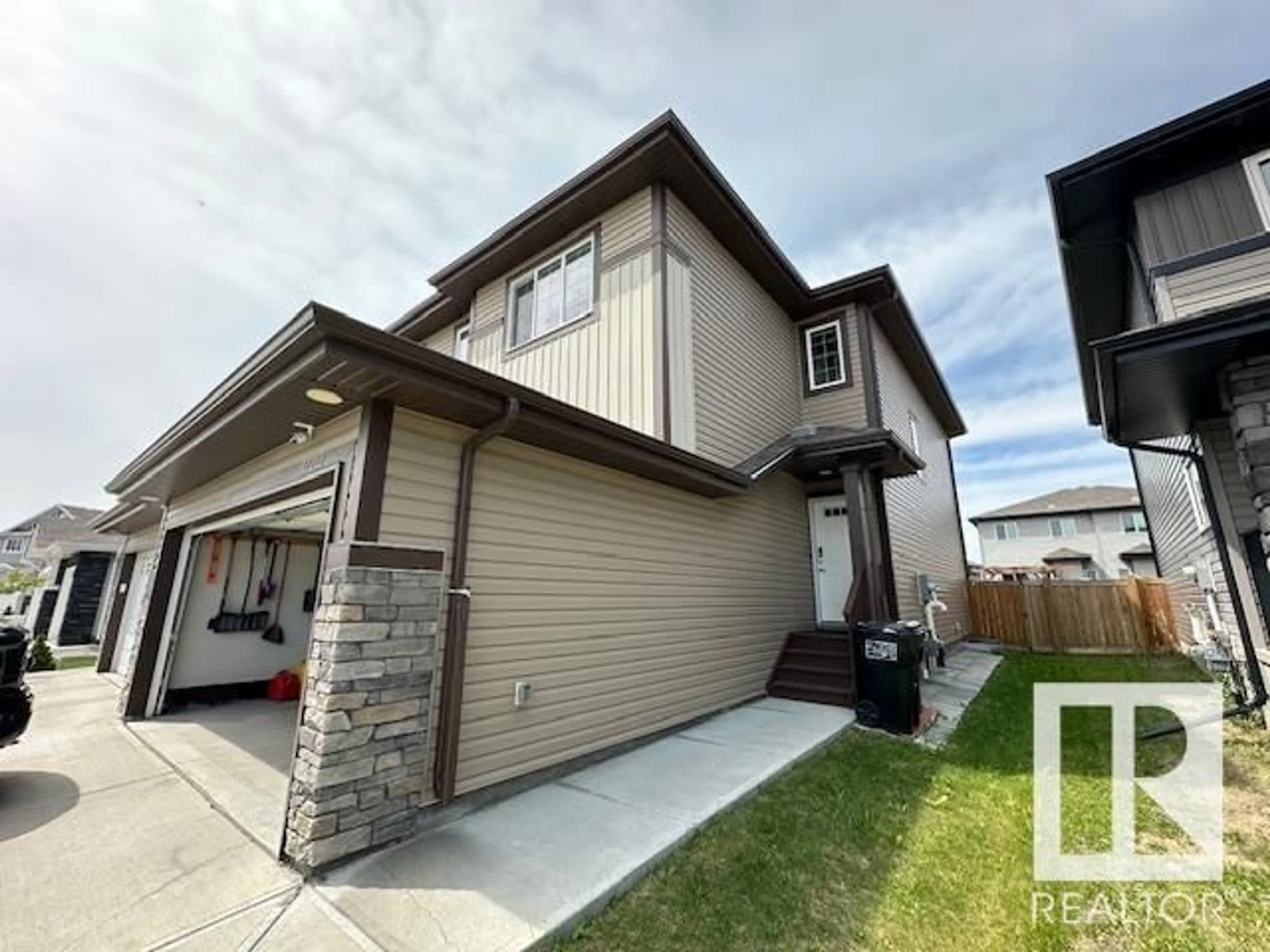Home with vinyl exterior material, street for 12212 176 AV, Edmonton Alberta T5X0L2