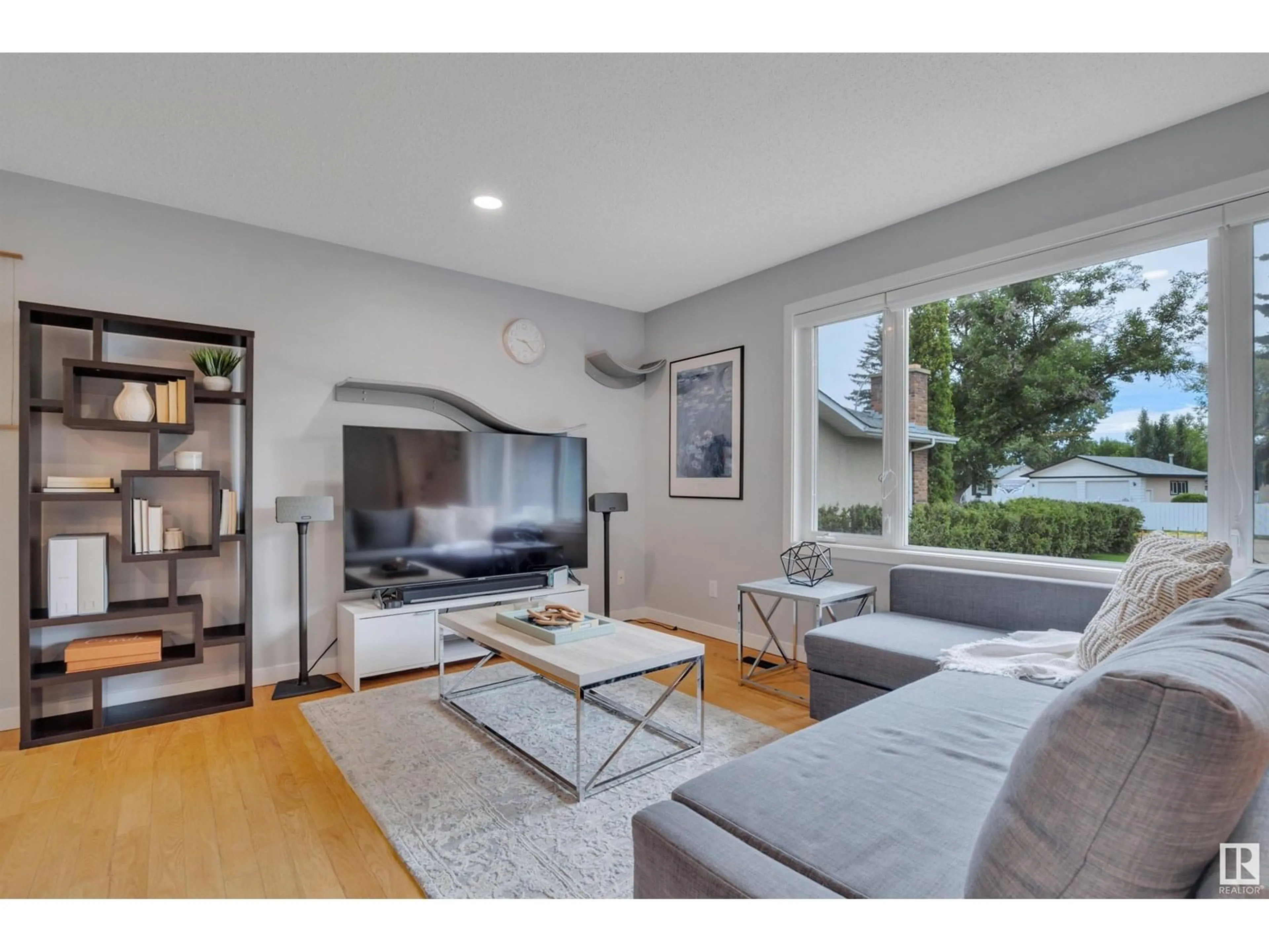 Living room with furniture, wood/laminate floor for 26A ROSEWOOD DR, Sherwood Park Alberta T8A2H3