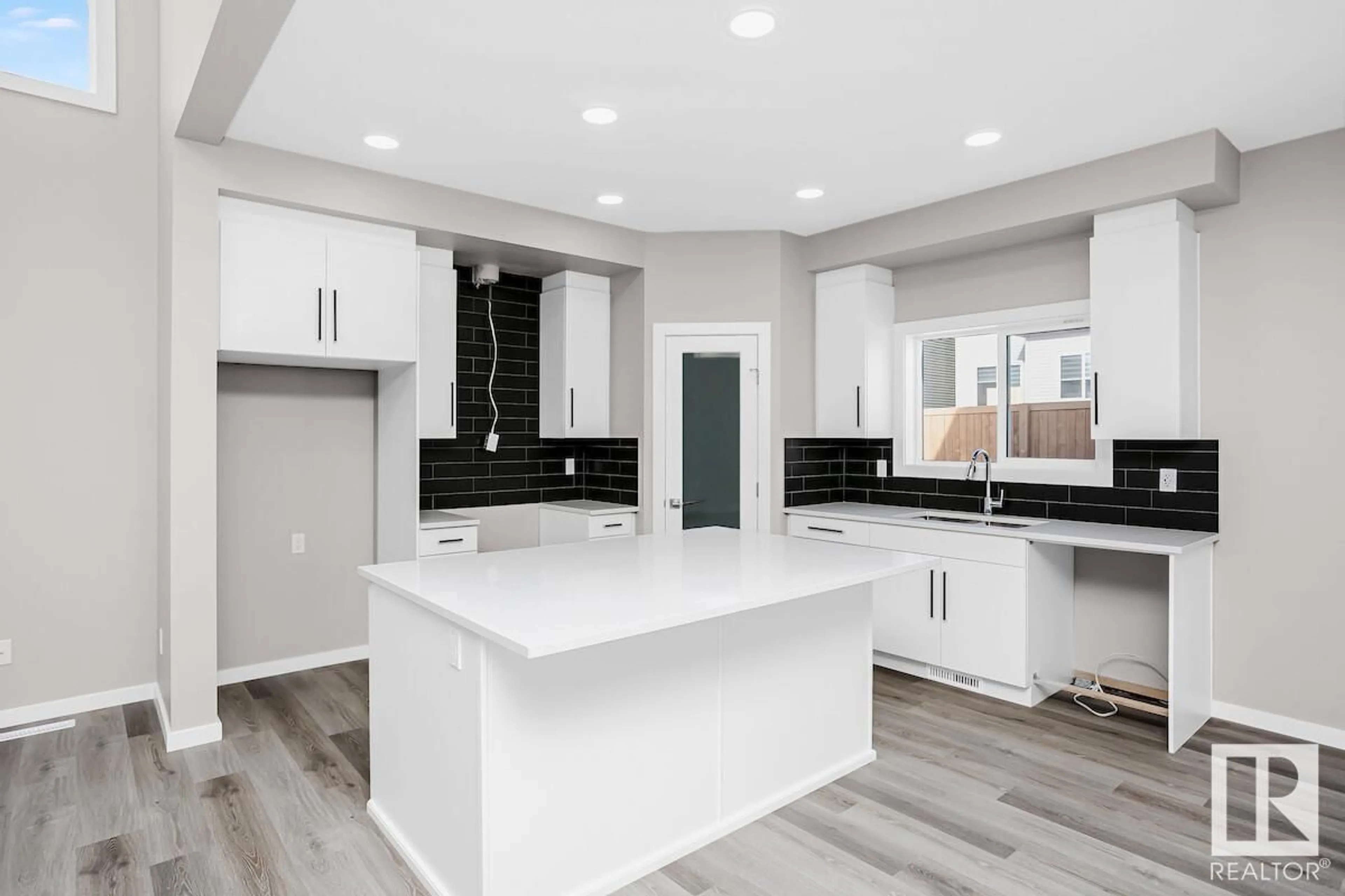 Open concept kitchen, ceramic/tile floor for 2908 65 ST, Edmonton Alberta T6X2Z3