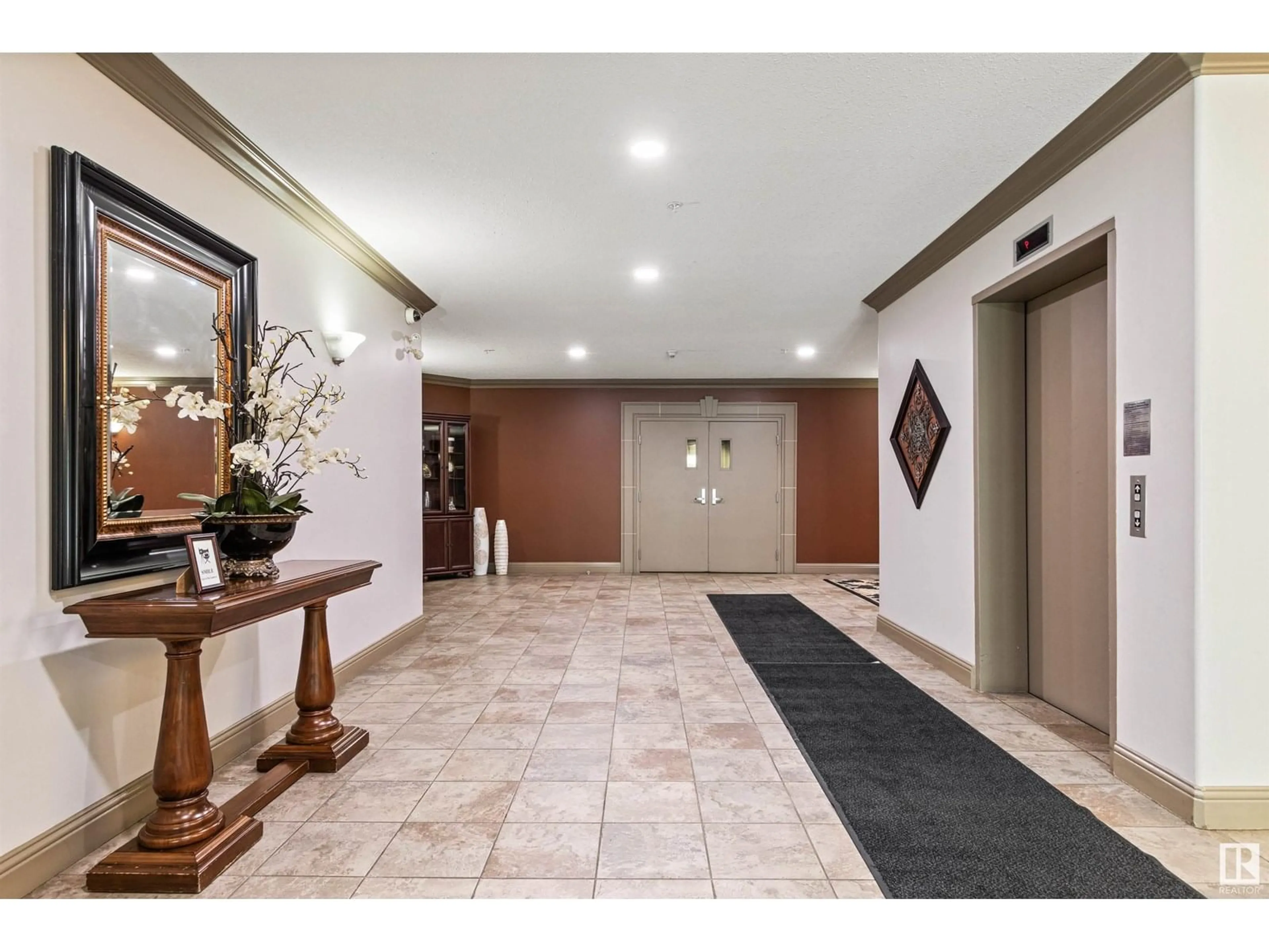 Indoor foyer for 131 - 1406 HODGSON WY, Edmonton Alberta T6R3K1