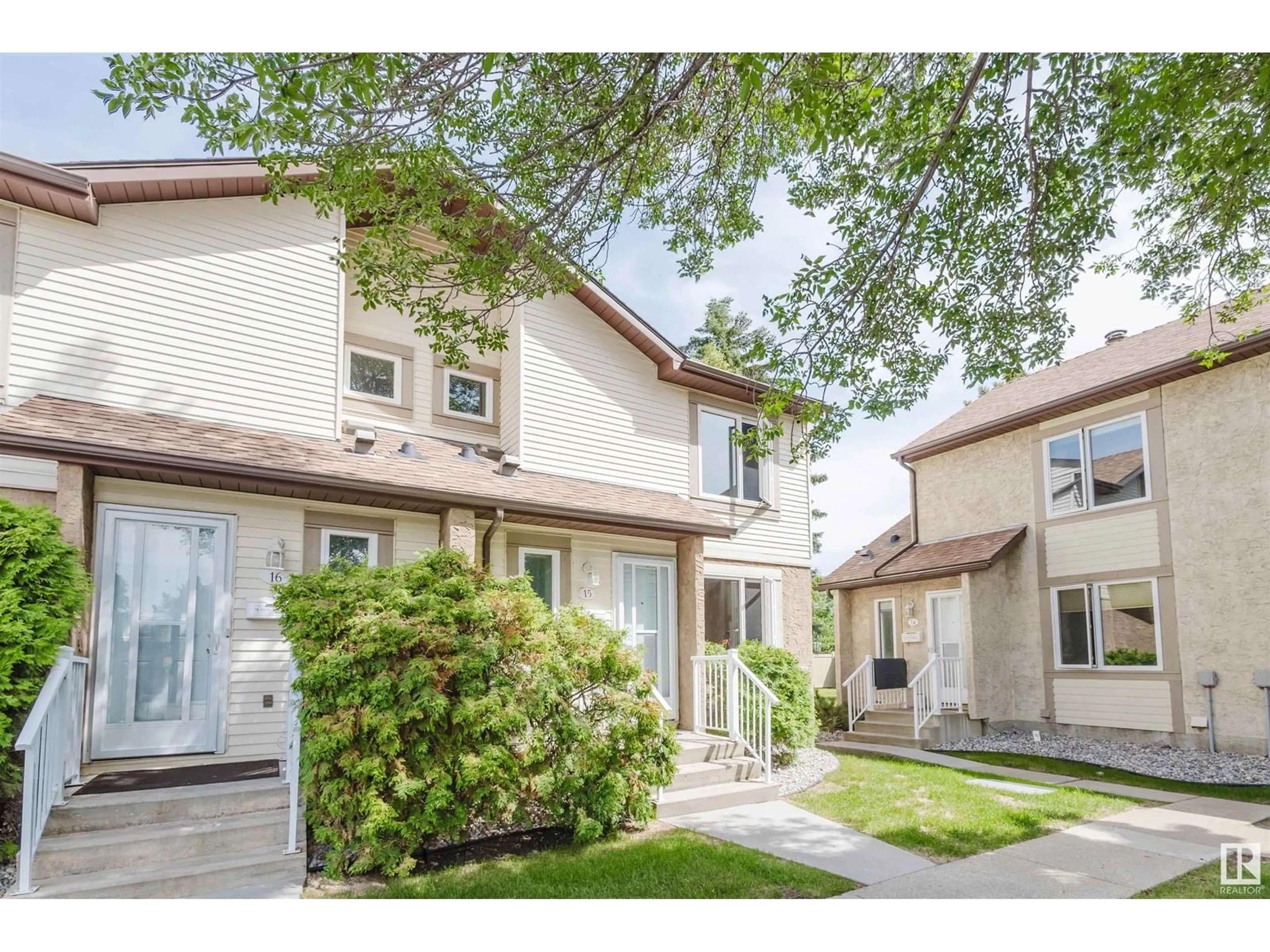 Home with vinyl exterior material, street for 15 - 11111 26 AV, Edmonton Alberta T6J5M7