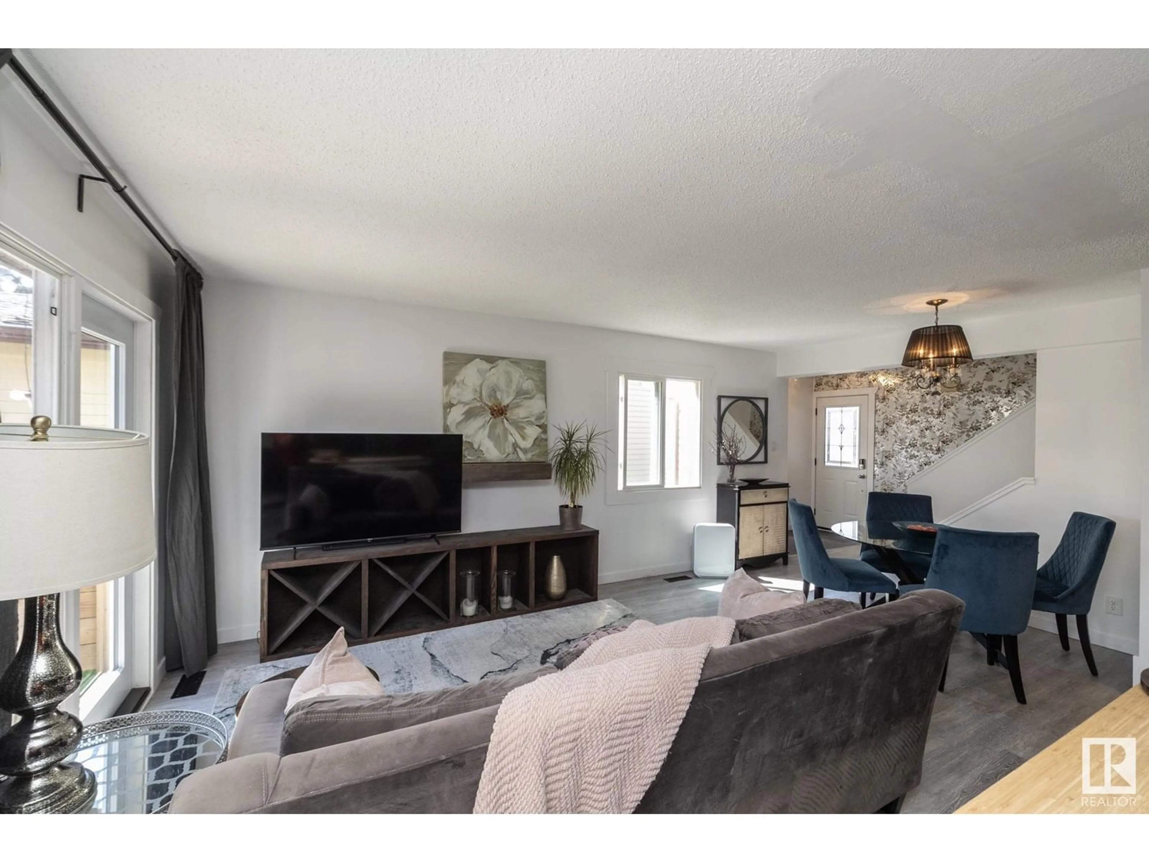 Living room with furniture, unknown for 54 PIPESTONE DR, Devon Alberta T9G1T3