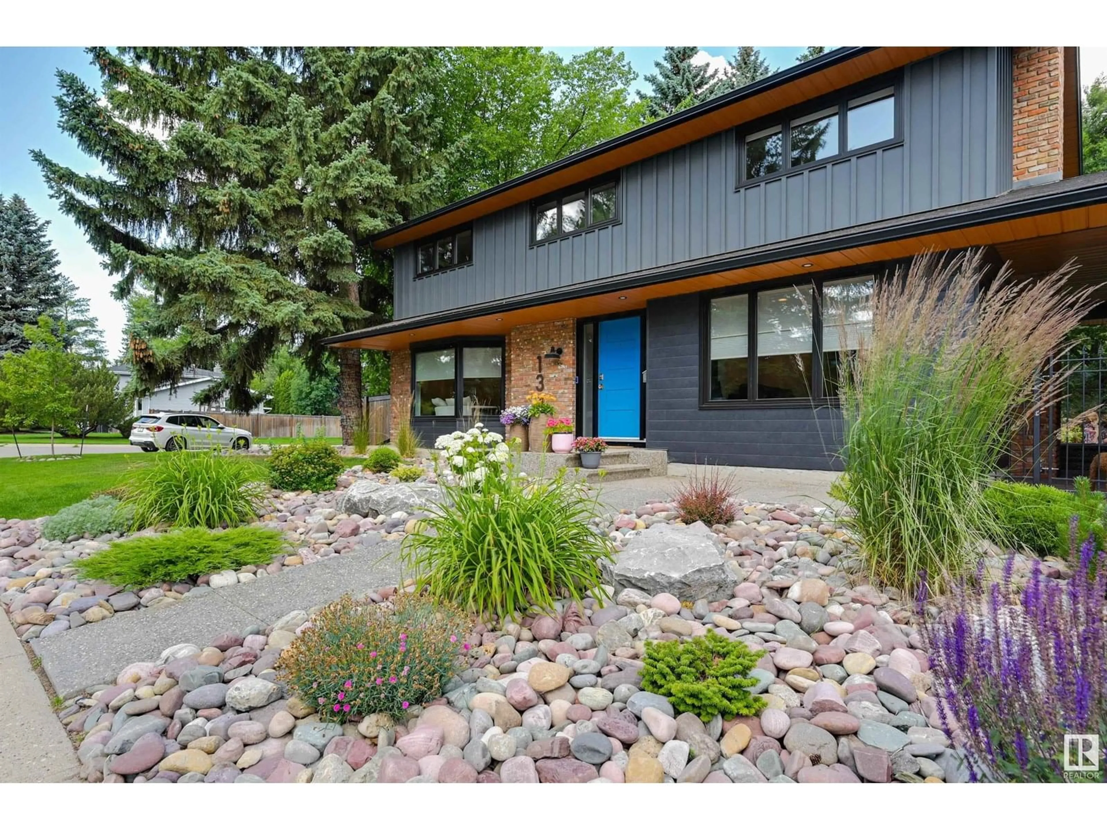 Home with brick exterior material, street for 134 QUESNELL CR, Edmonton Alberta T5R5P2