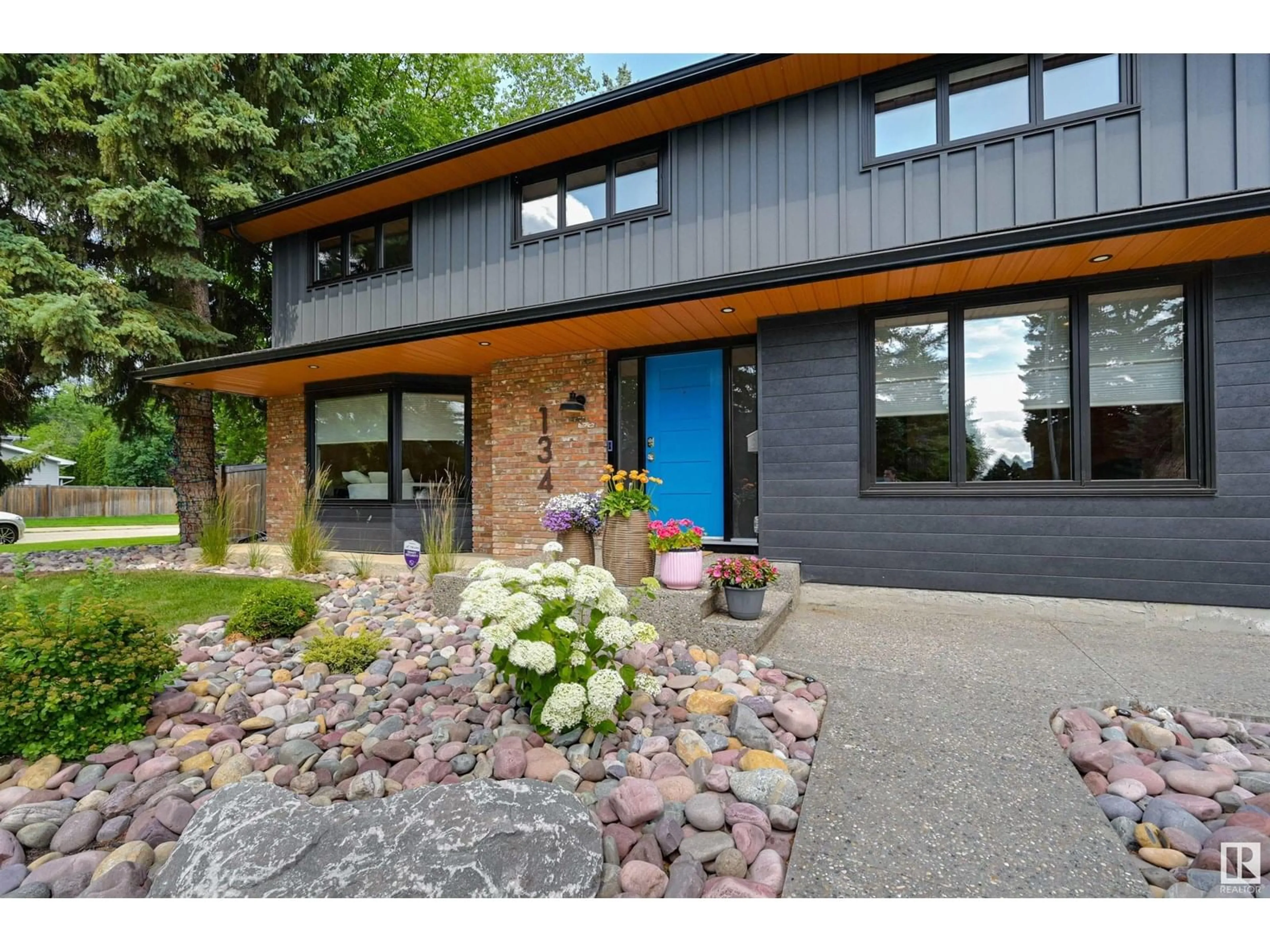 Home with brick exterior material, street for 134 QUESNELL CR, Edmonton Alberta T5R5P2