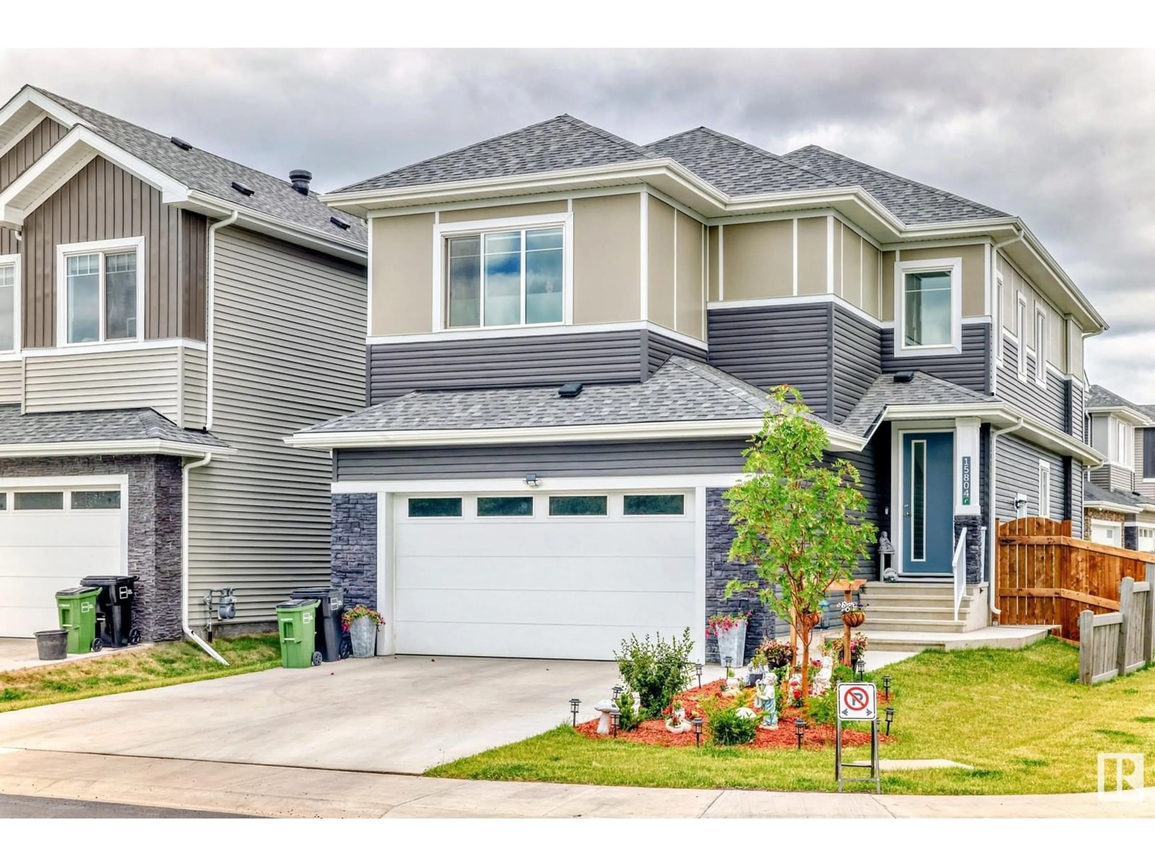 Home with vinyl exterior material, street for SW - 15804 34 AV, Edmonton Alberta T6W5A1