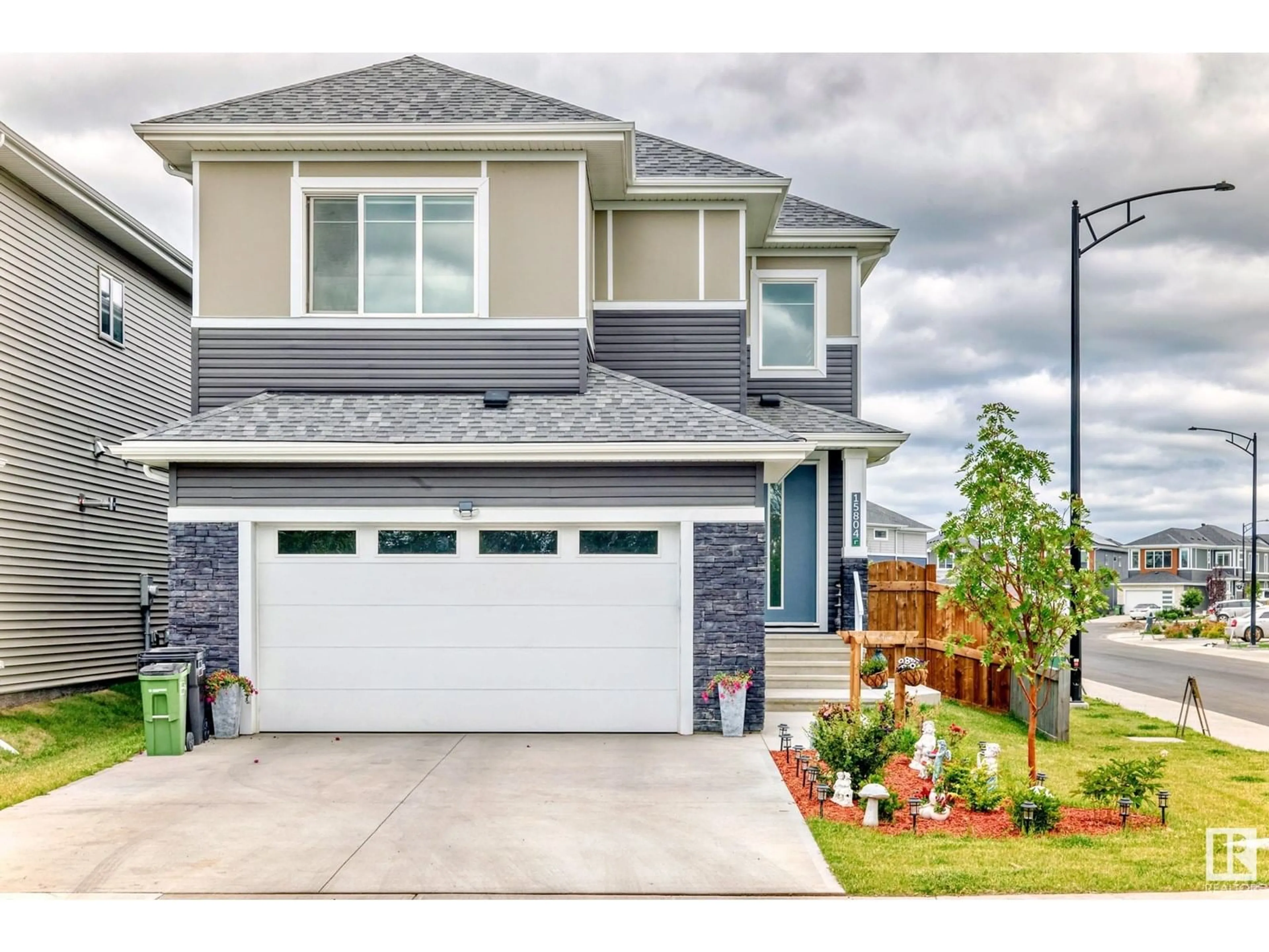 Home with vinyl exterior material, street for SW - 15804 34 AV, Edmonton Alberta T6W5A1