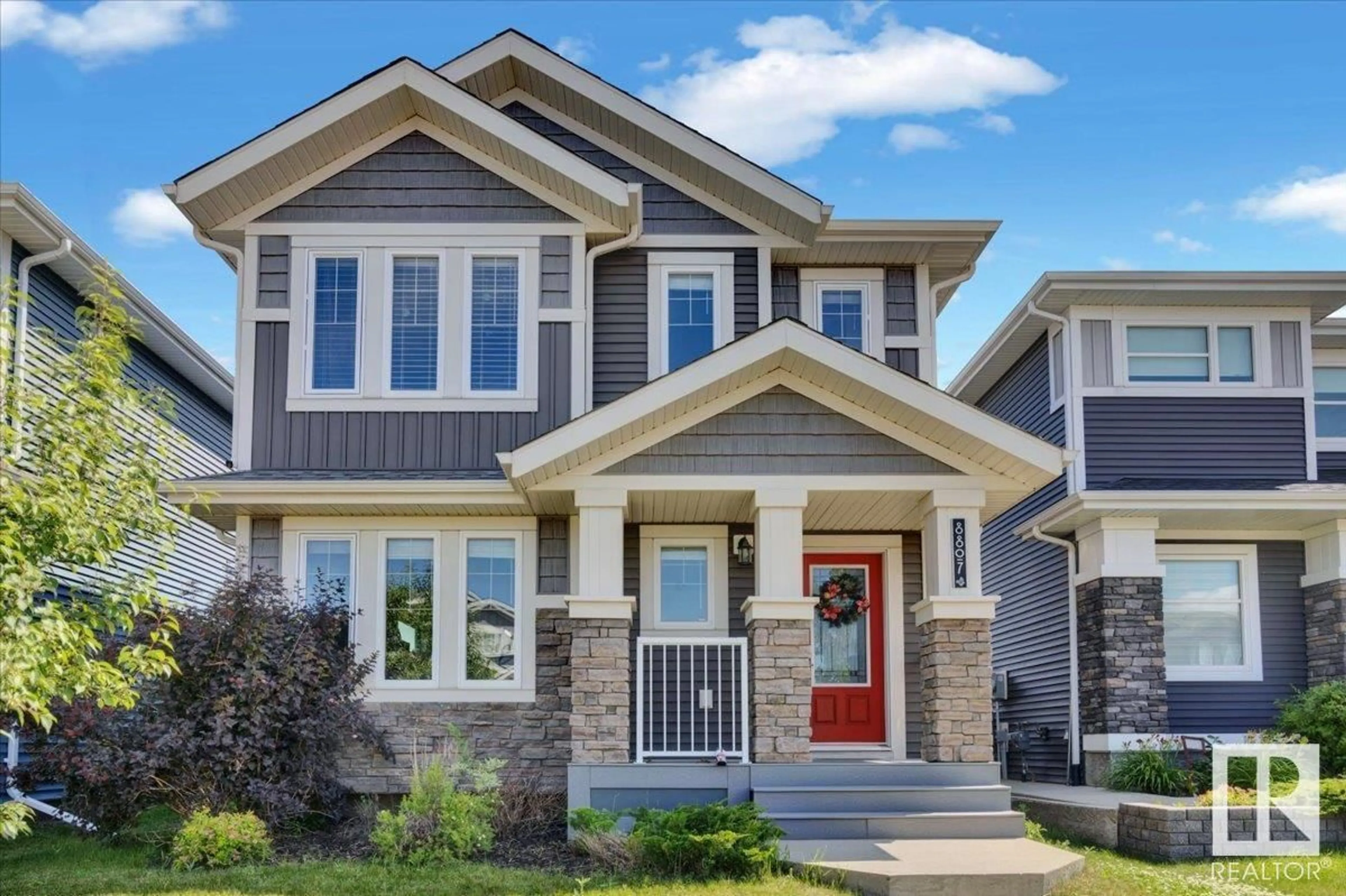 Home with vinyl exterior material, street for NW - 8807 223 ST, Edmonton Alberta T5T7H2