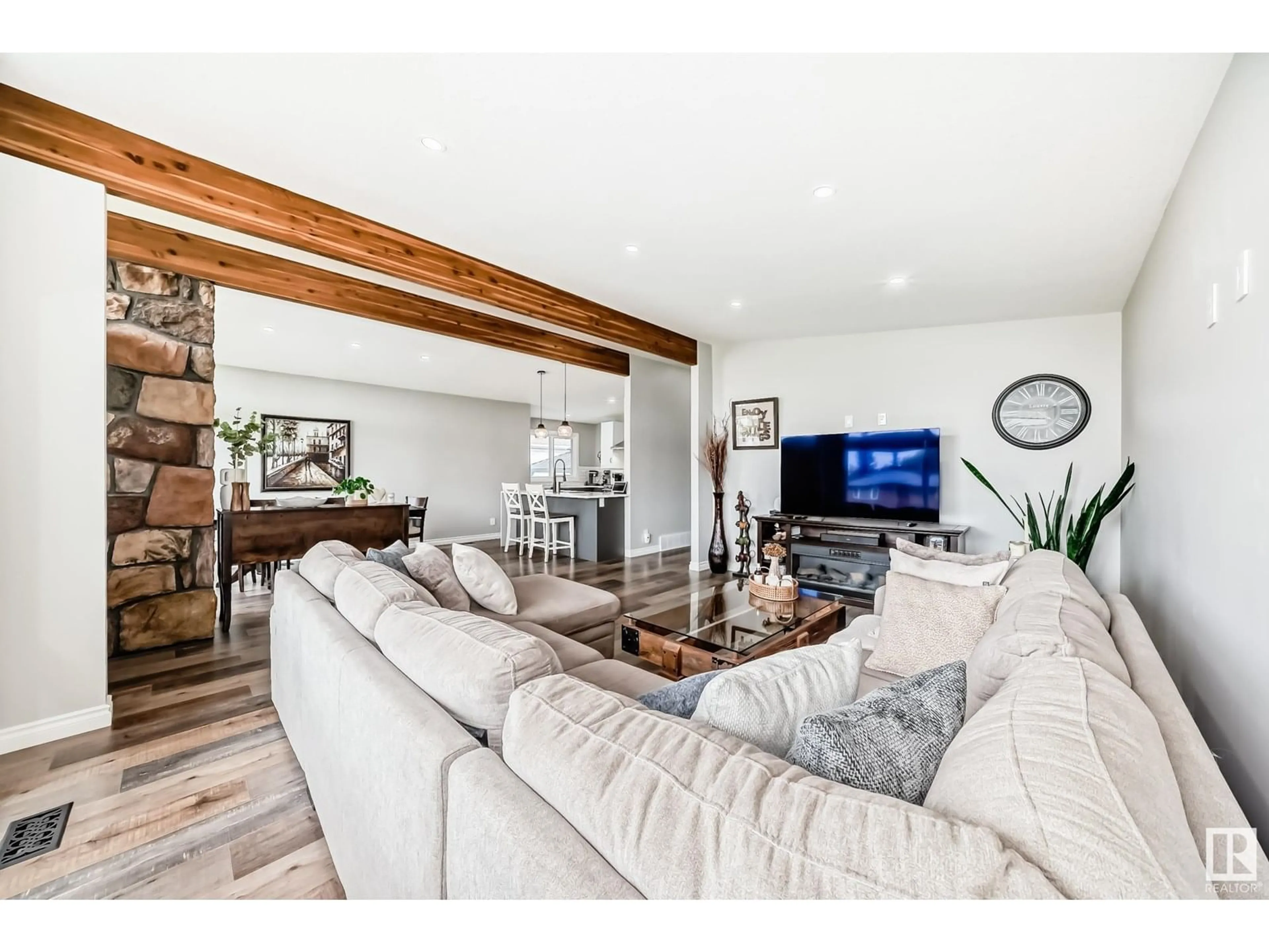 Living room with furniture, wood/laminate floor for 13514 91 ST, Edmonton Alberta T5E3R1