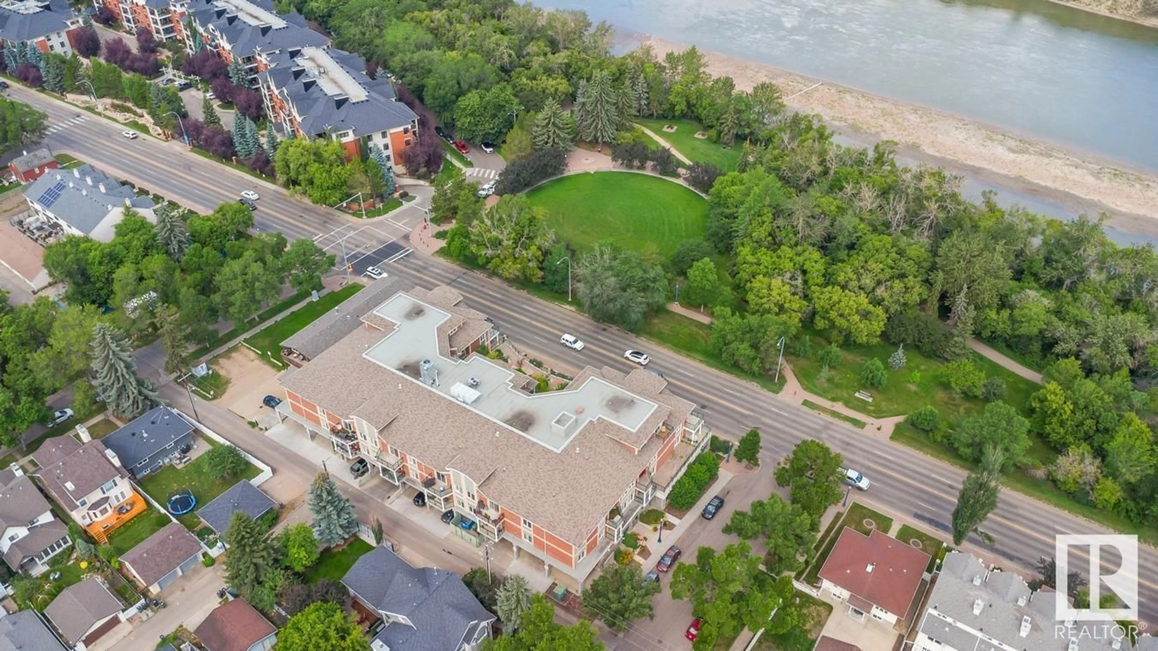 A pic from outside/outdoor area/front of a property/back of a property/a pic from drone, water/lake/river/ocean view for 205 9750 94 ST NW, Edmonton Alberta T6C2E3