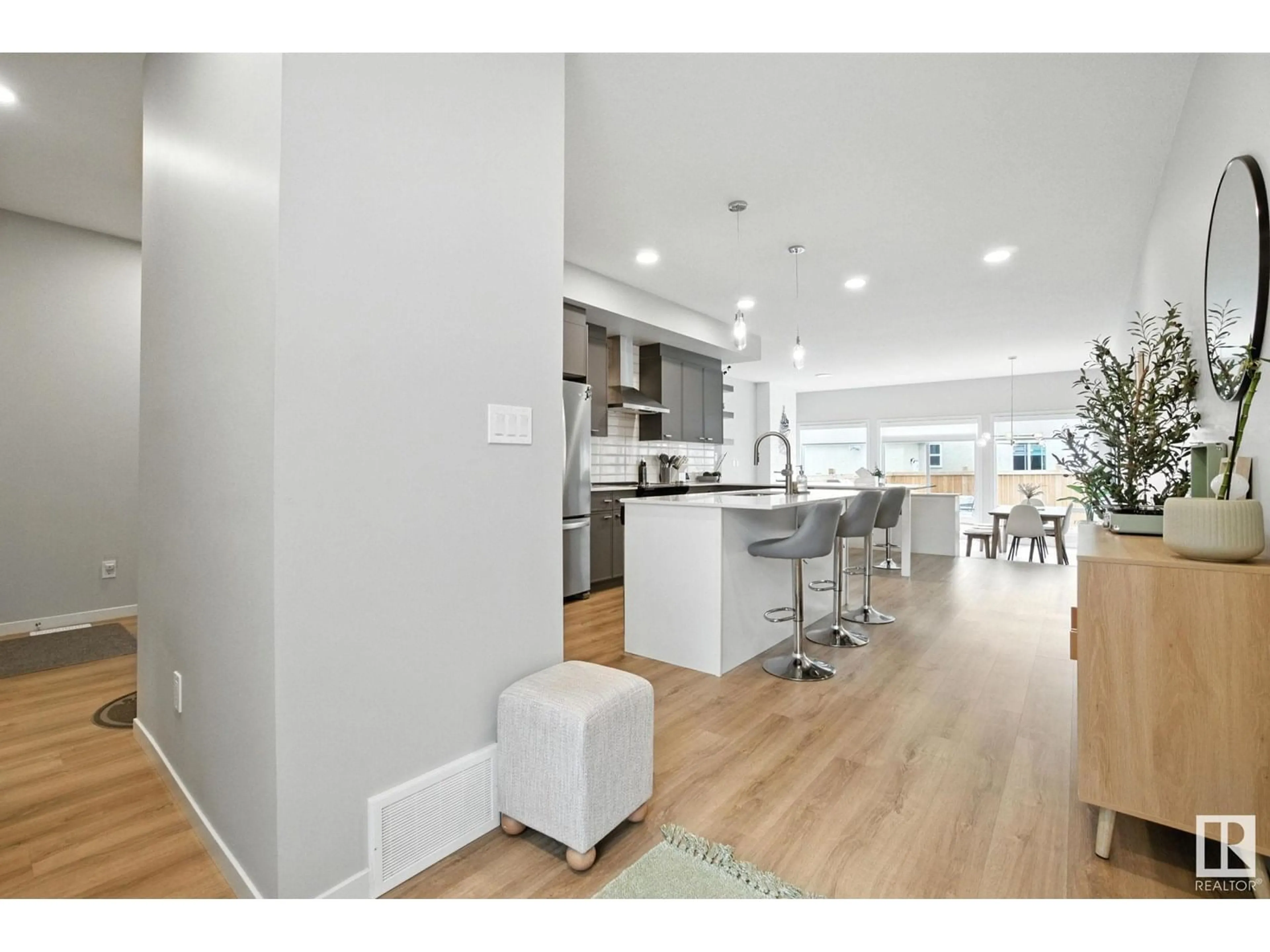 Open concept kitchen, wood/laminate floor for NW - 17367 100 ST, Edmonton Alberta T5X0M5