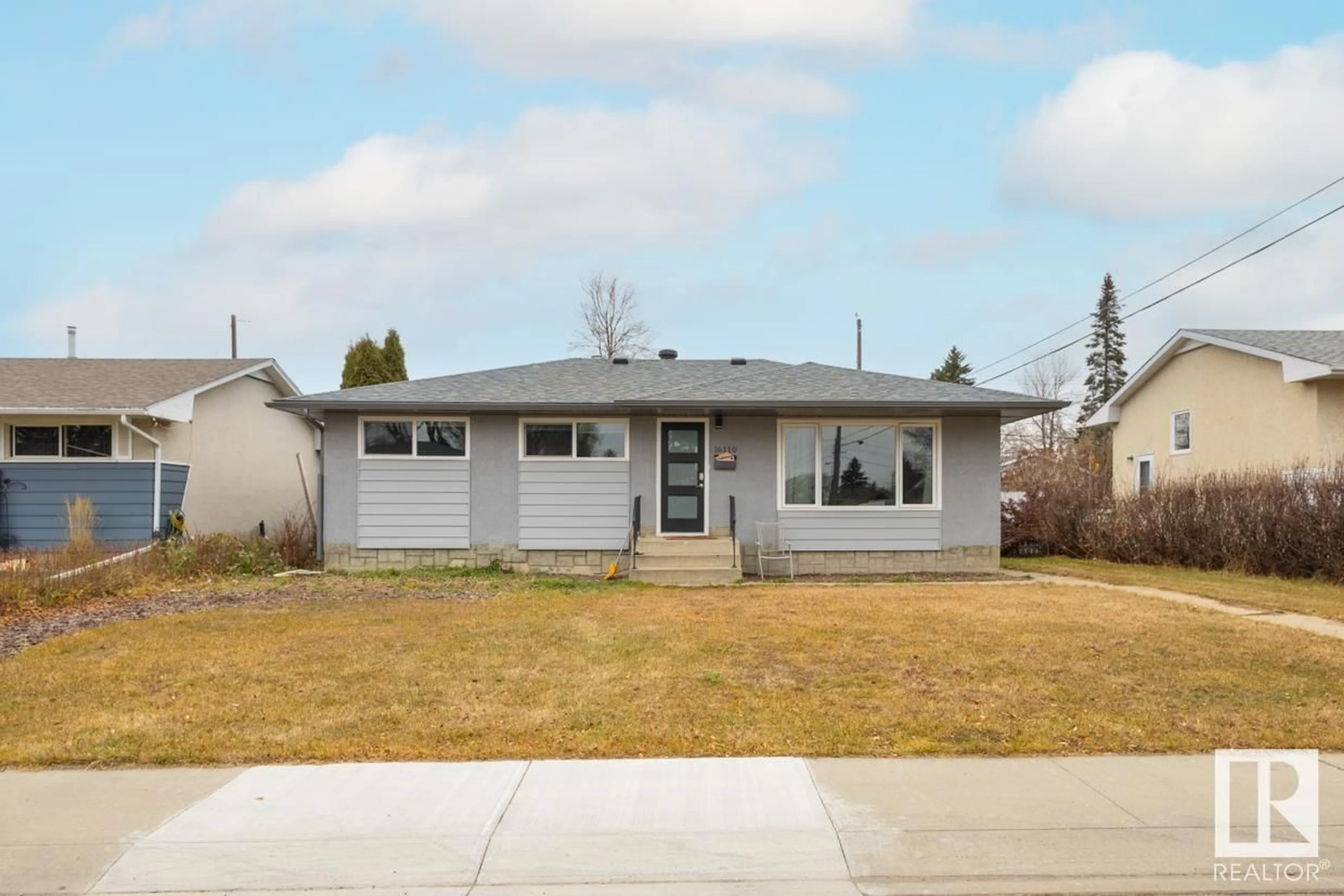 Home with vinyl exterior material, street for 16110 82 AV, Edmonton Alberta T5R3S4