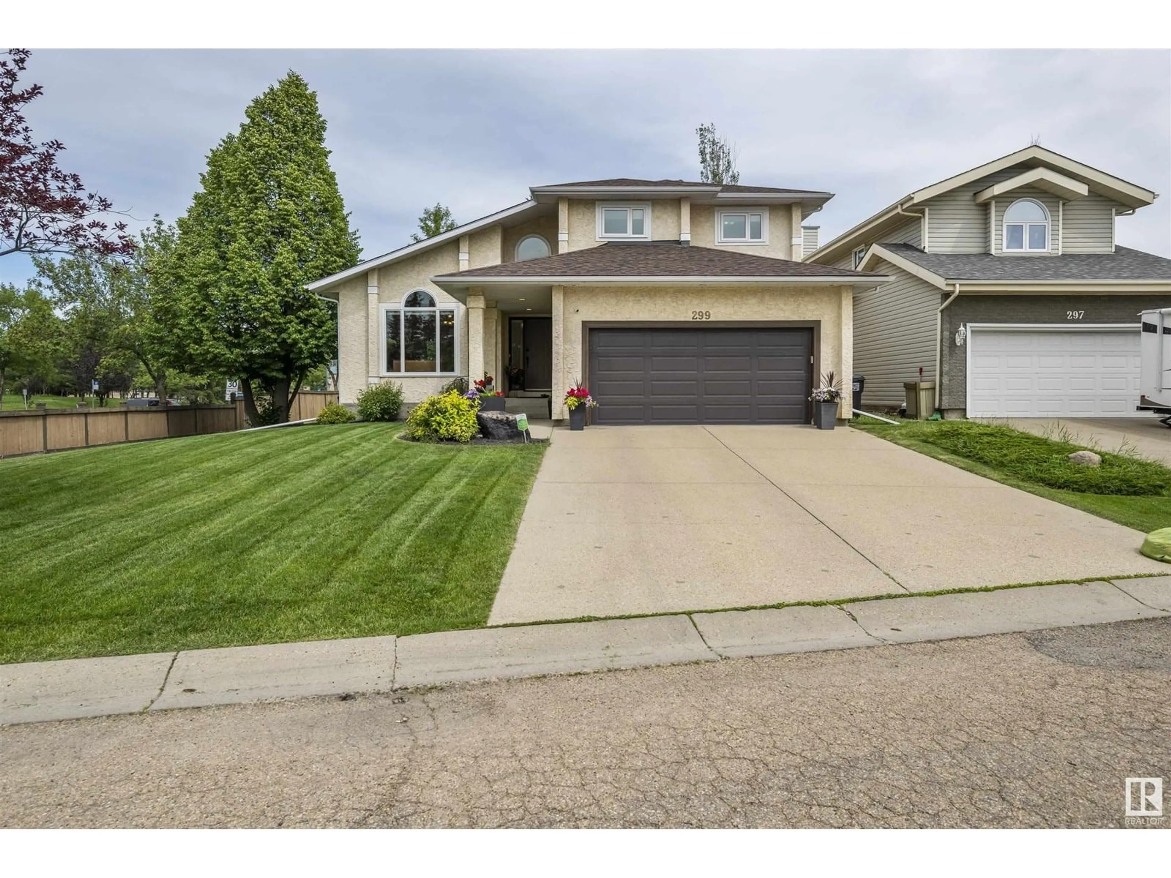 Home with vinyl exterior material, street for 299 BULYEA RD, Edmonton Alberta T6R1R8