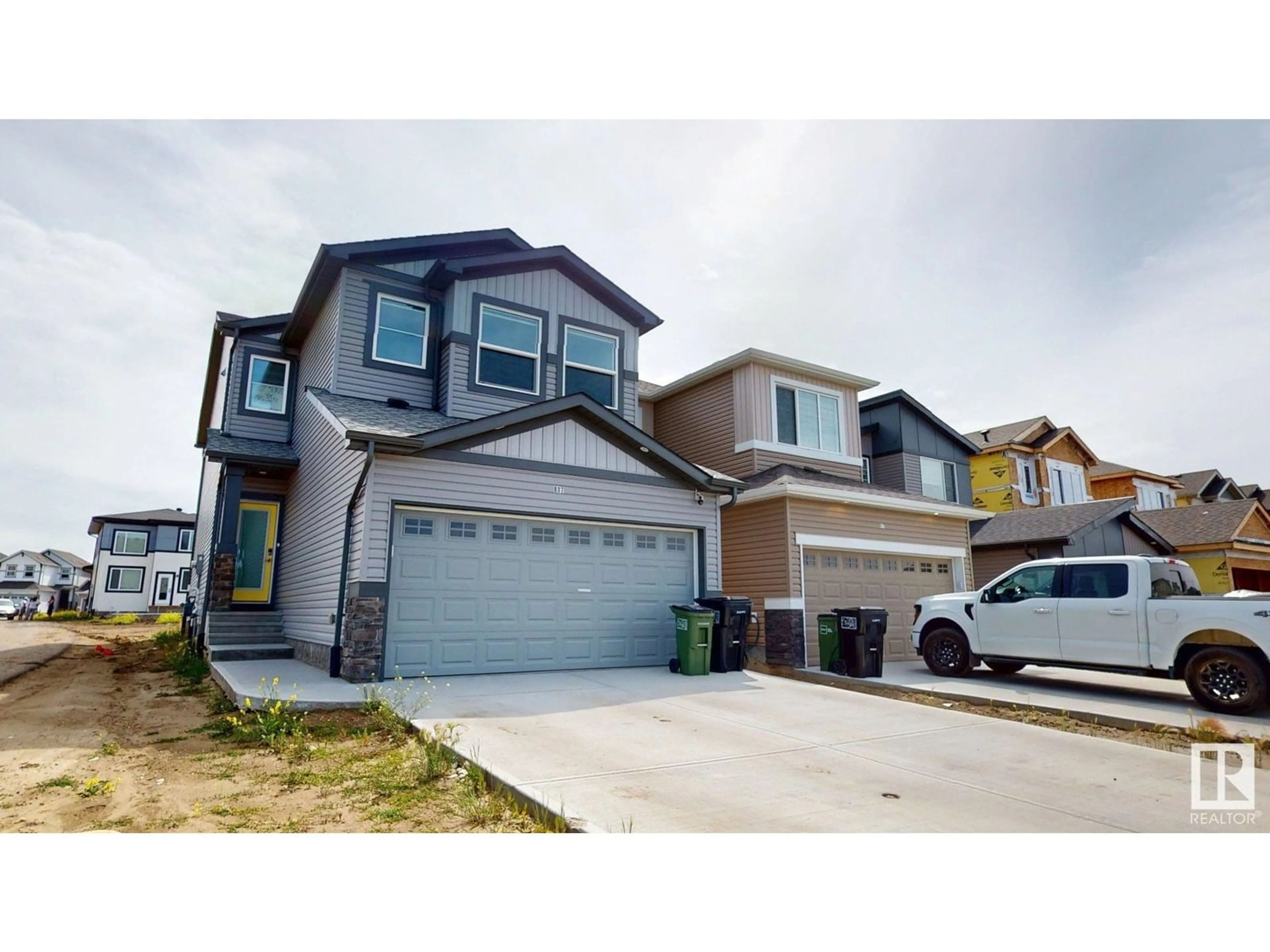 Home with vinyl exterior material, street for 607 31 AV, Edmonton Alberta T6T2V6
