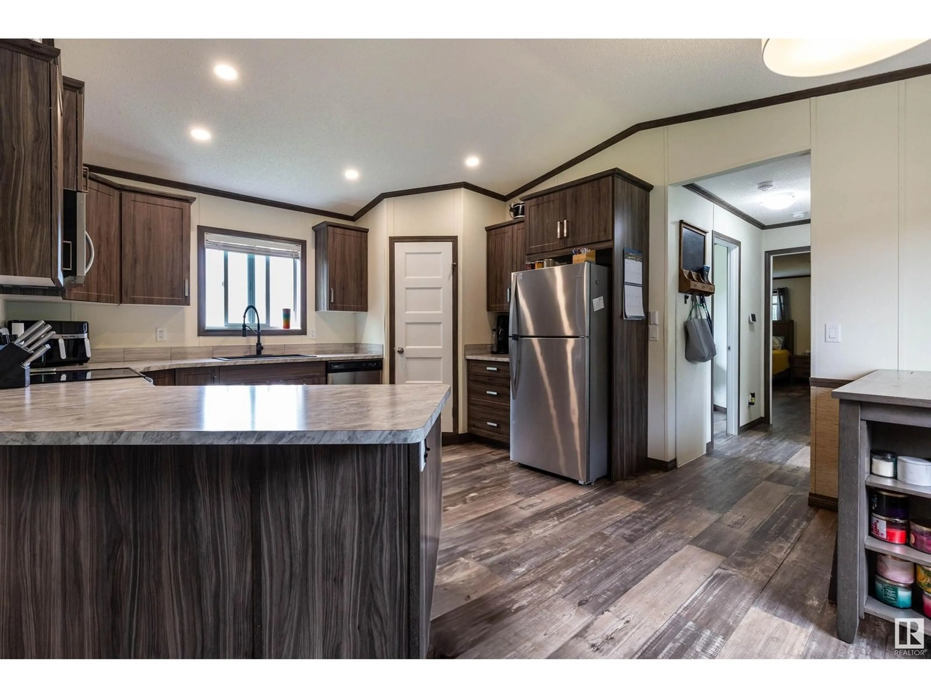 Open concept kitchen, wood/laminate floor for 55330 RGE ROAD 63, Rural Lac Ste. Anne County Alberta T0E2A0