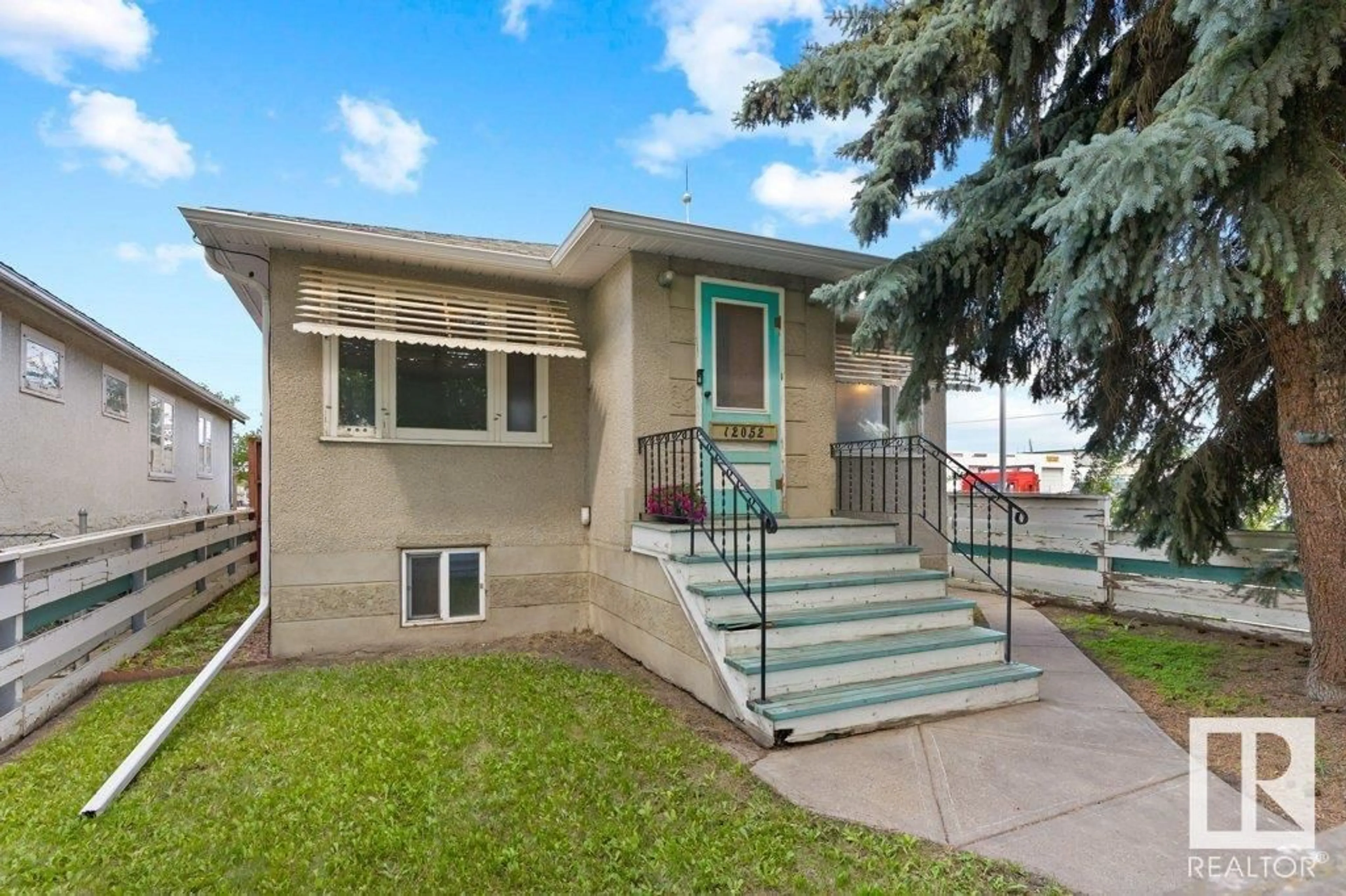 Home with vinyl exterior material, street for NW - 12052 69 ST, Edmonton Alberta T5B1S6