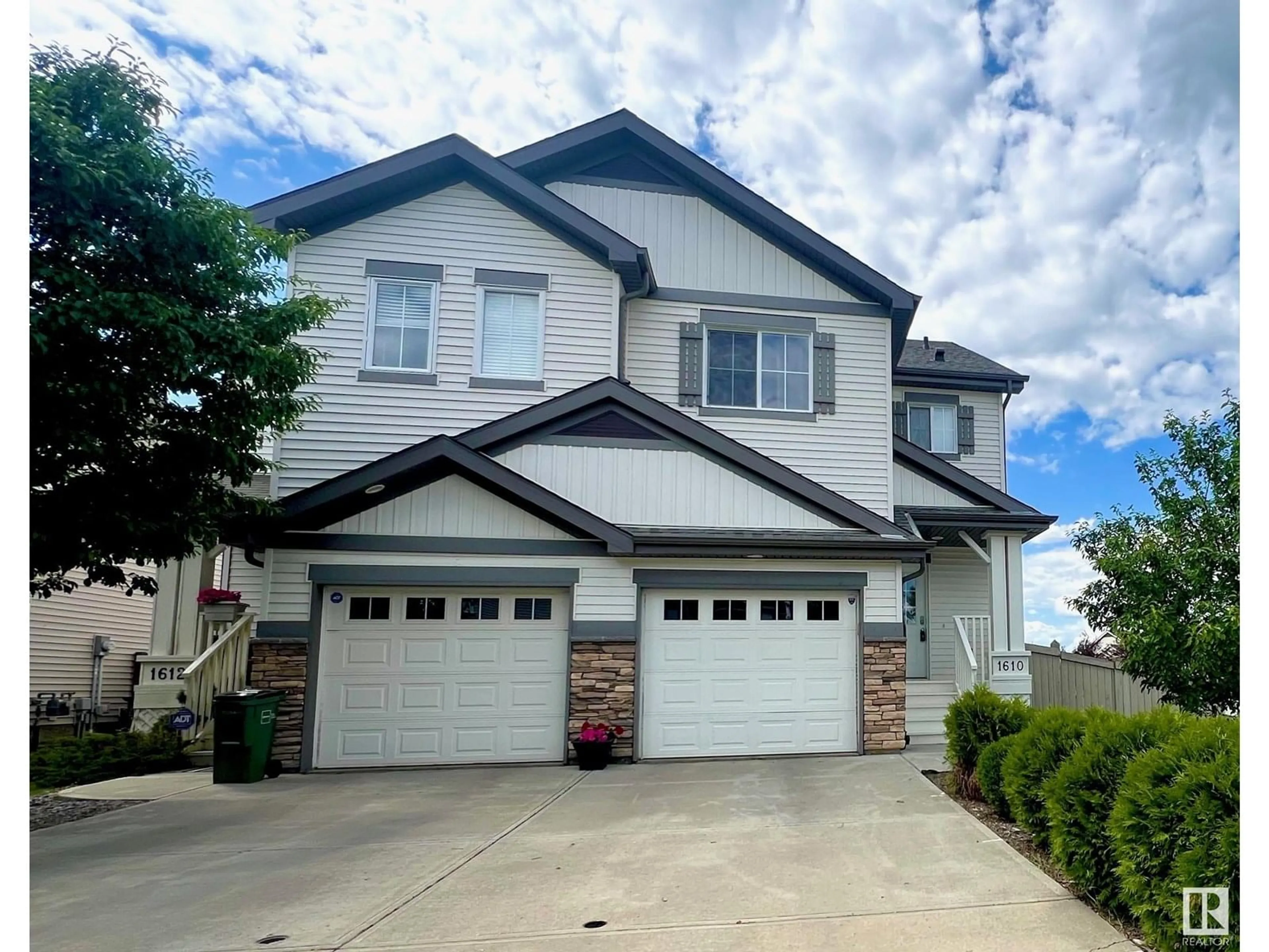 Home with vinyl exterior material, street for 1610 64 ST, Edmonton Alberta T6X0N2