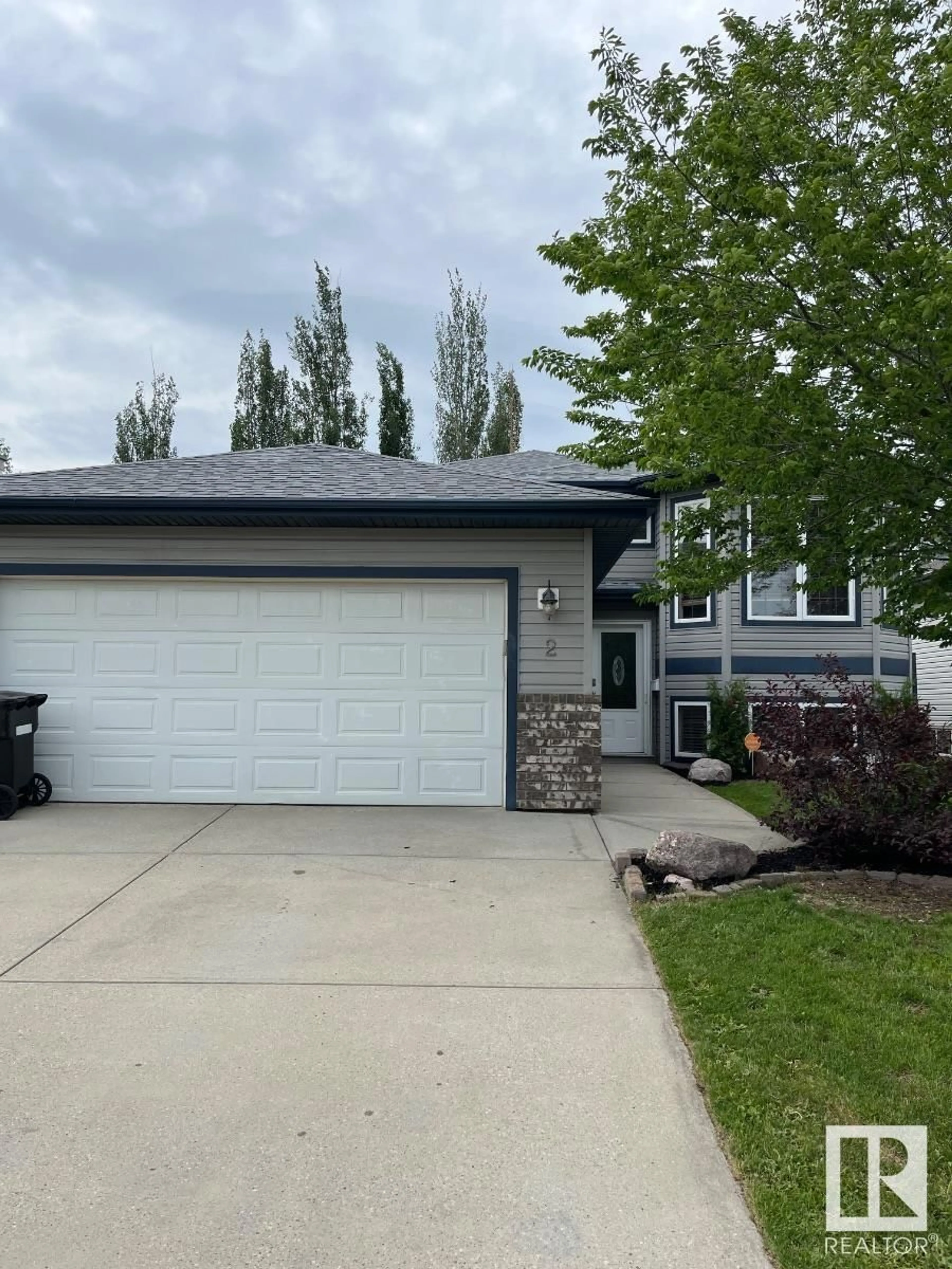 Home with vinyl exterior material, street for 2 WAKEFIELD PL, Leduc Alberta T9E8E7
