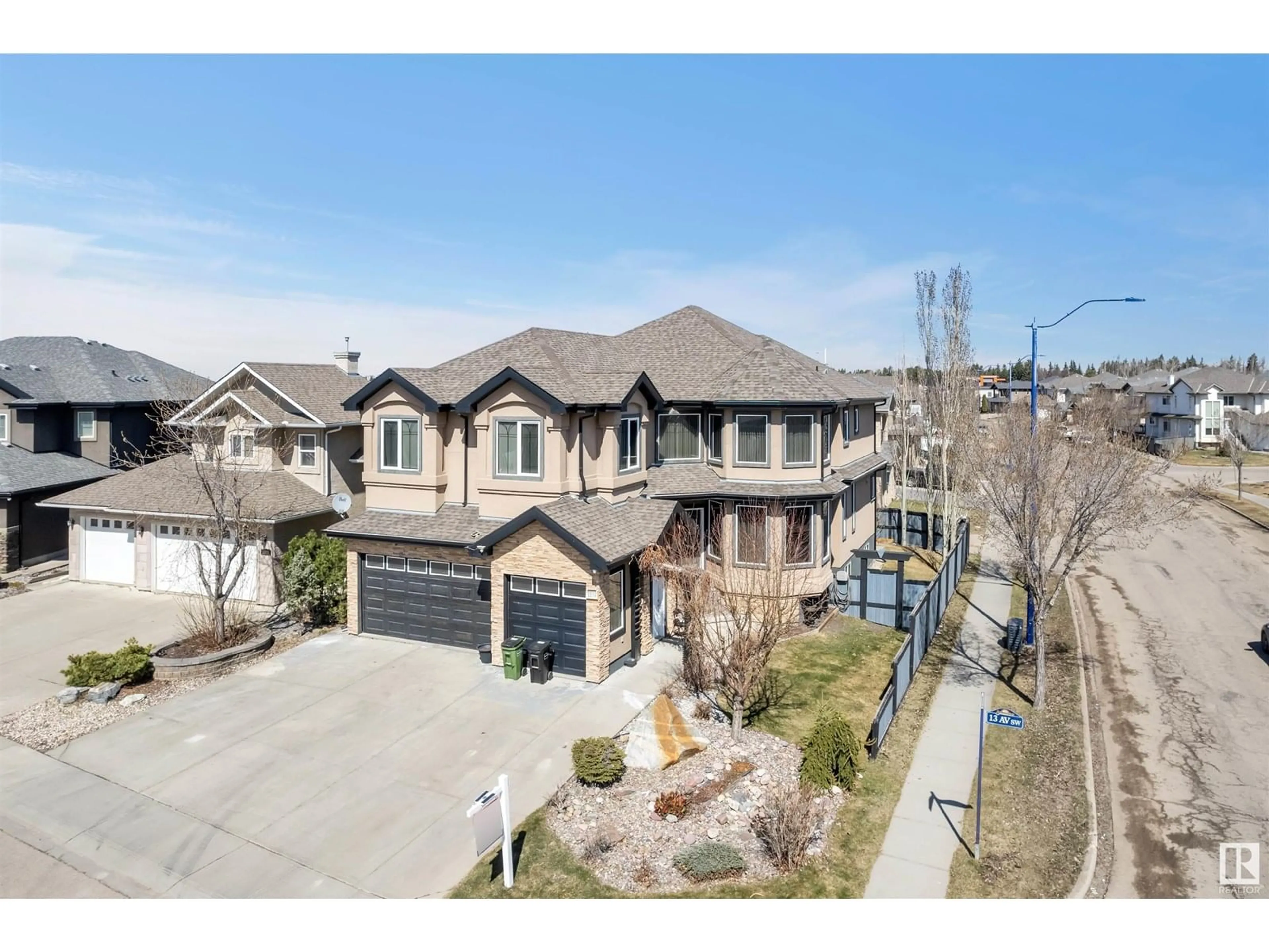 A pic from outside/outdoor area/front of a property/back of a property/a pic from drone, street for SW SW - 1304 70 ST, Edmonton Alberta T6X1K9