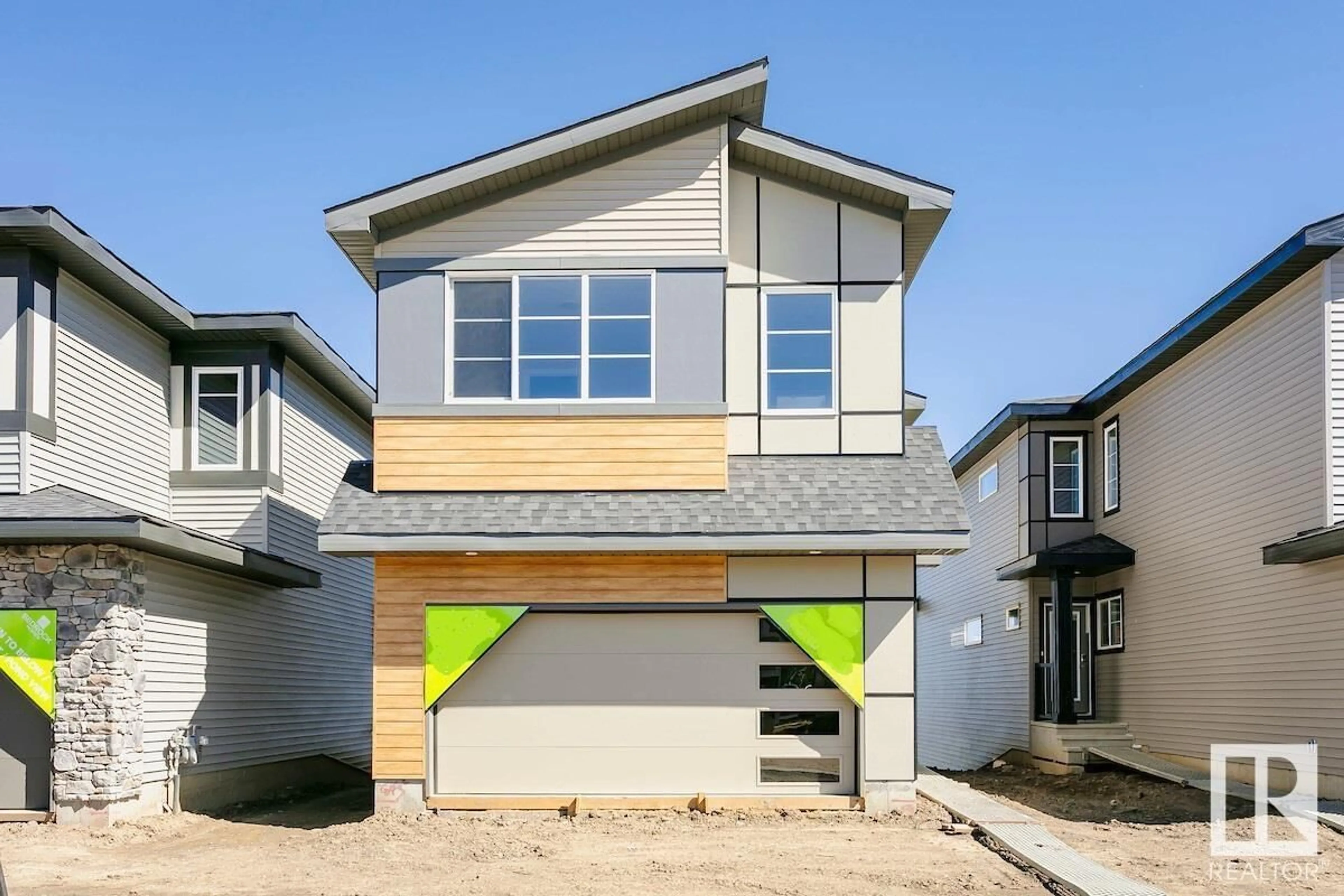 Home with vinyl exterior material, street for 36 GAMBEL LO, Spruce Grove Alberta T7X0C9