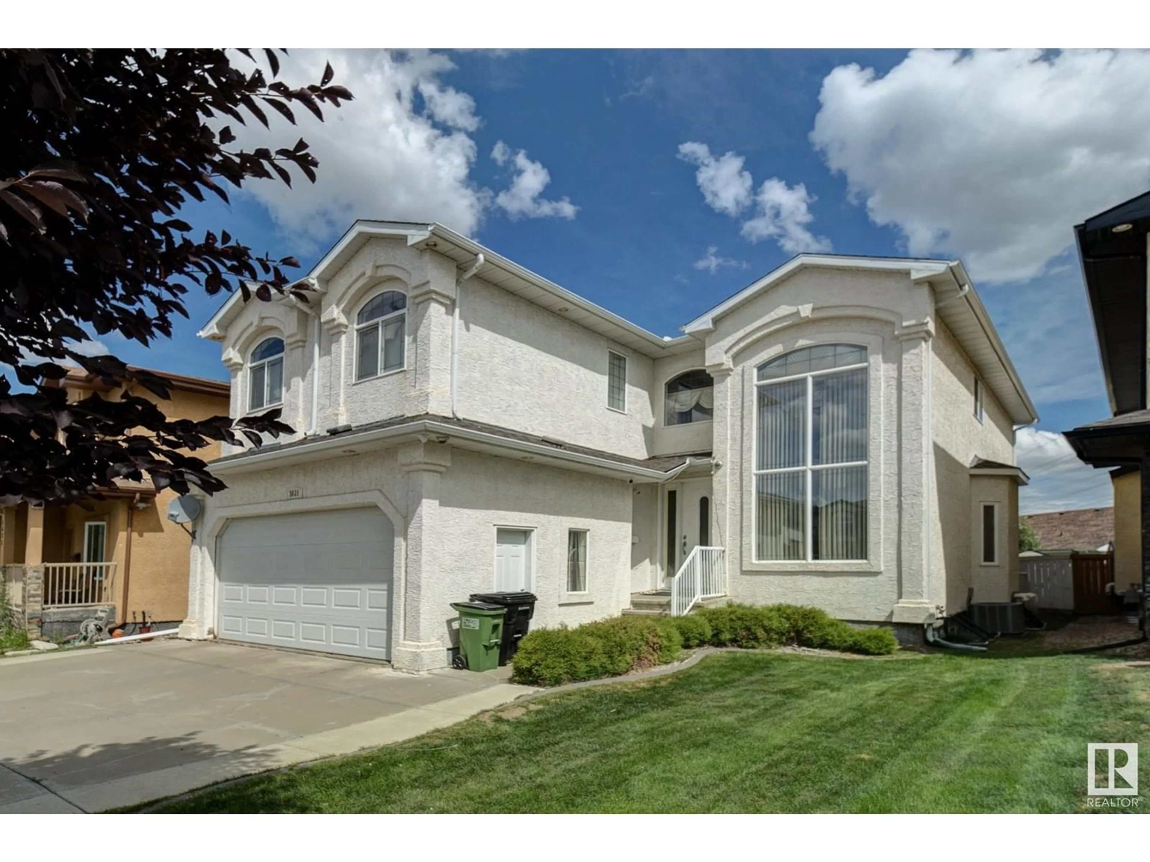 Home with vinyl exterior material, street for 3621 28A ST NW, Edmonton Alberta T6T1N4