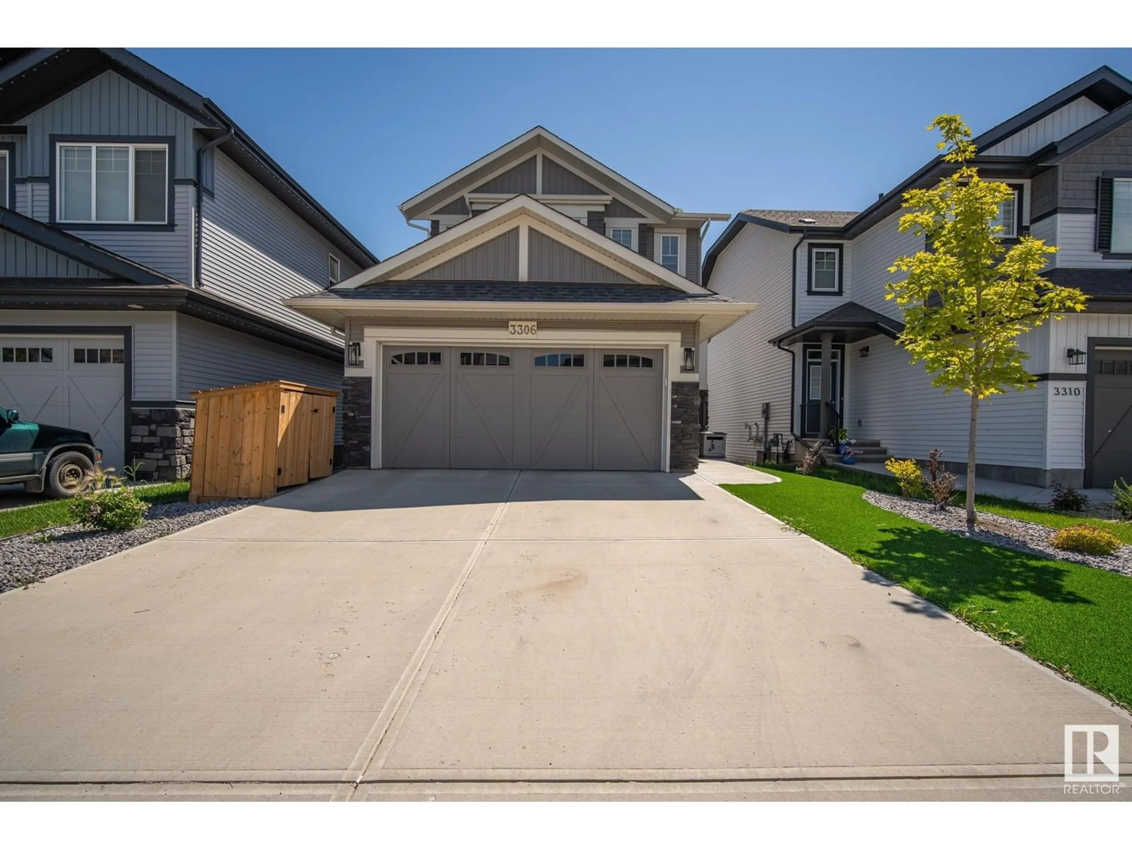 Home with vinyl exterior material, street for 3306 PARKER LO SW, Edmonton Alberta T6W4C2