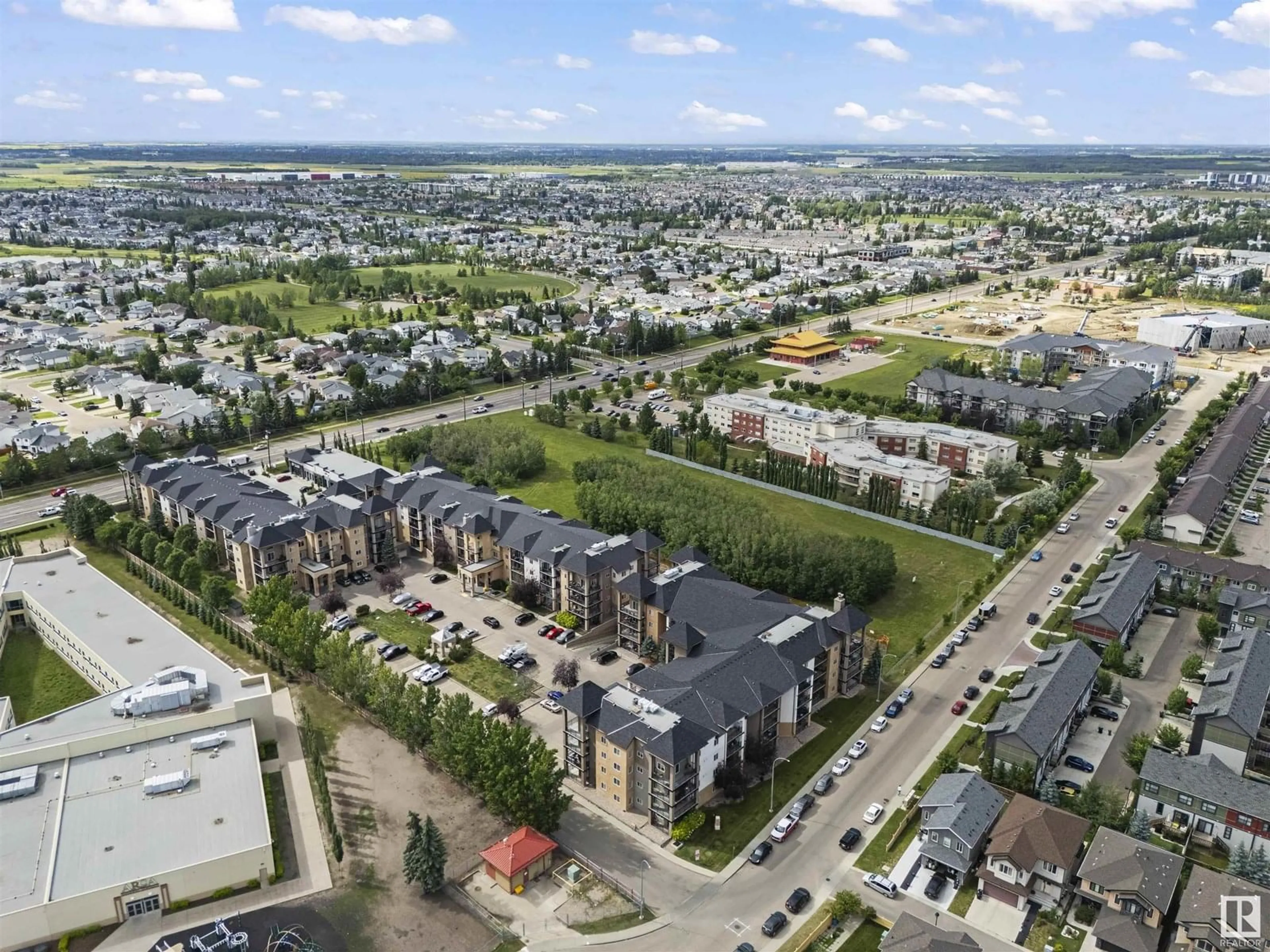 A pic from outside/outdoor area/front of a property/back of a property/a pic from drone, street for #107 - 14604 125 ST, Edmonton Alberta T5X0B4