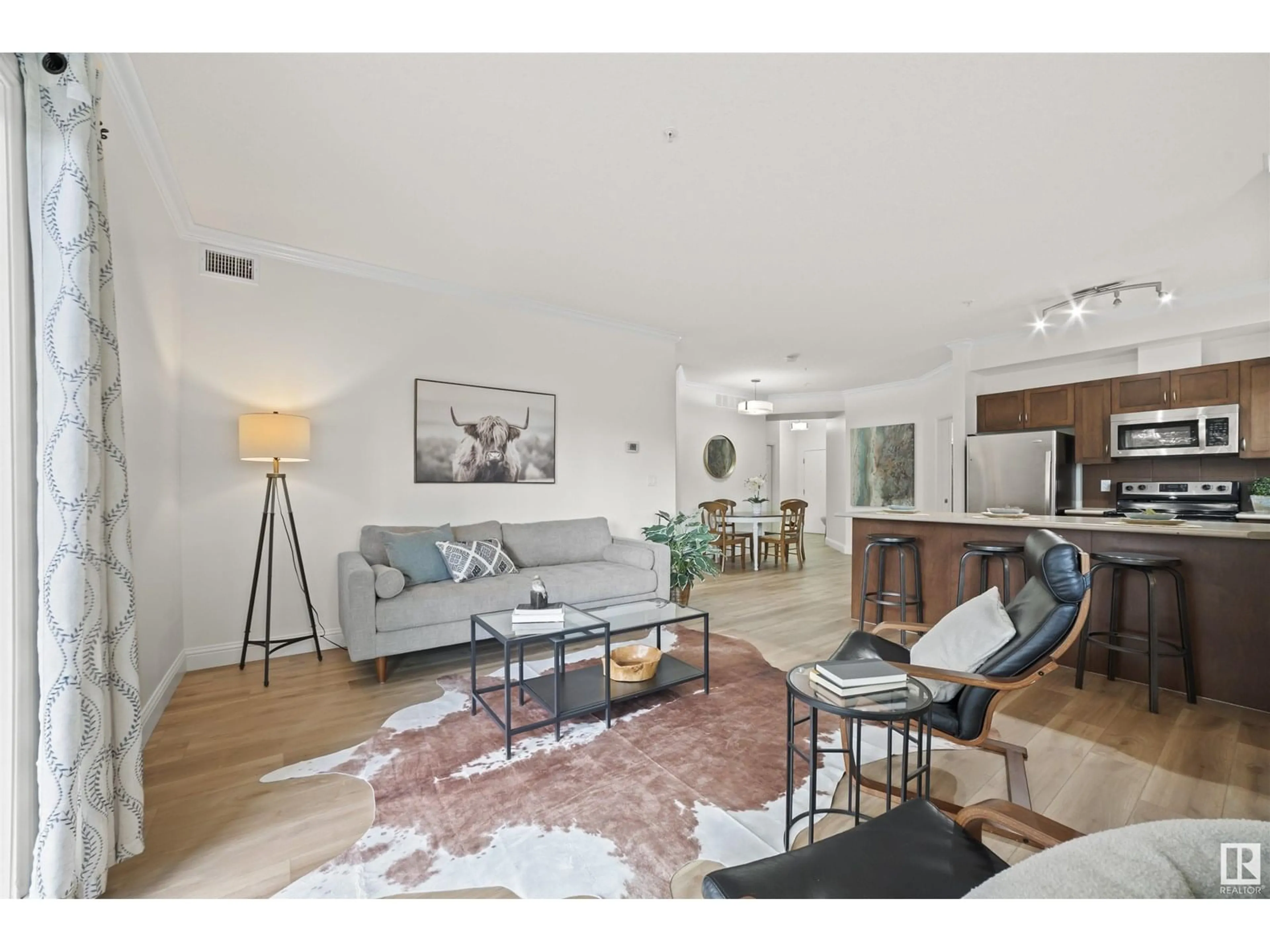 Living room with furniture, unknown for #107 - 14604 125 ST, Edmonton Alberta T5X0B4