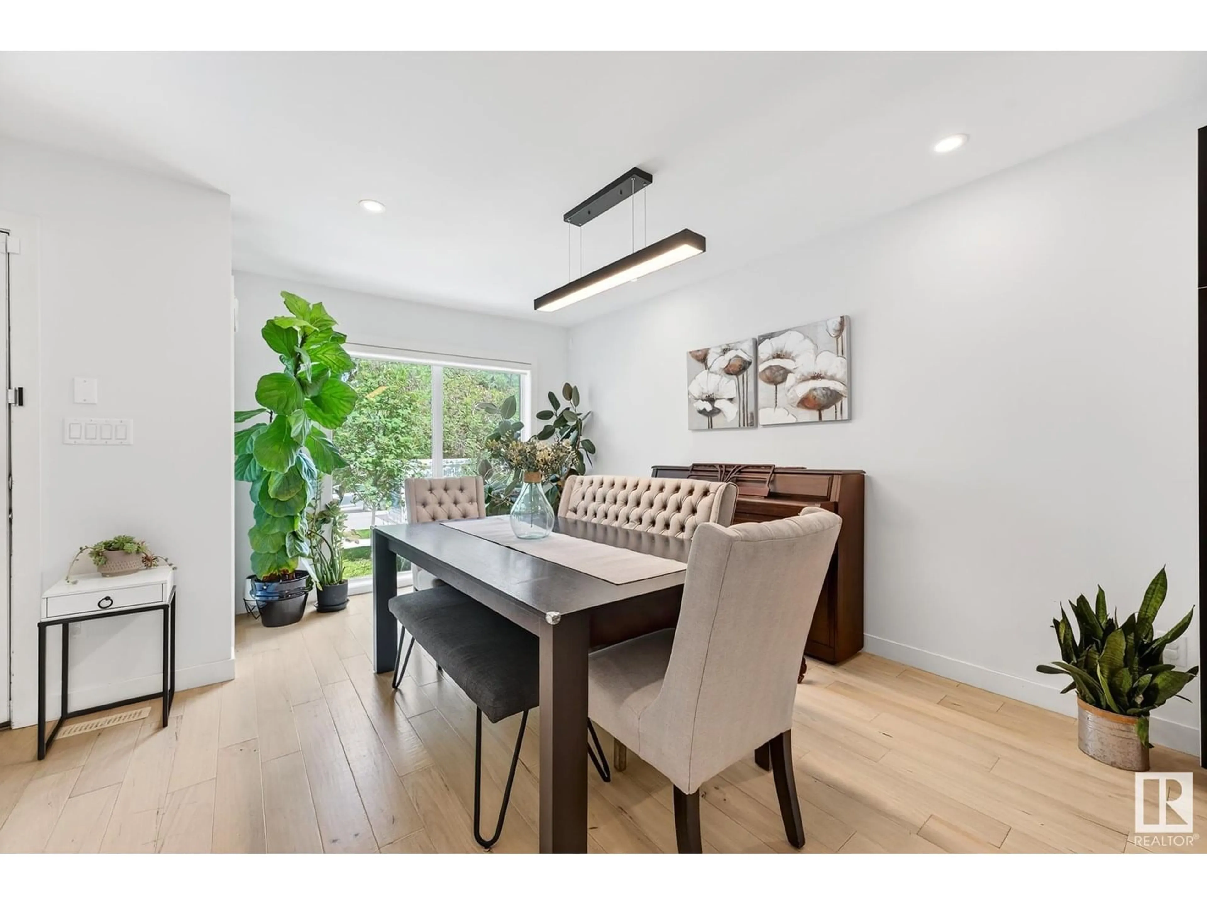 Dining room, wood/laminate floor for 10811 64 AVE, Edmonton Alberta T6H1T3