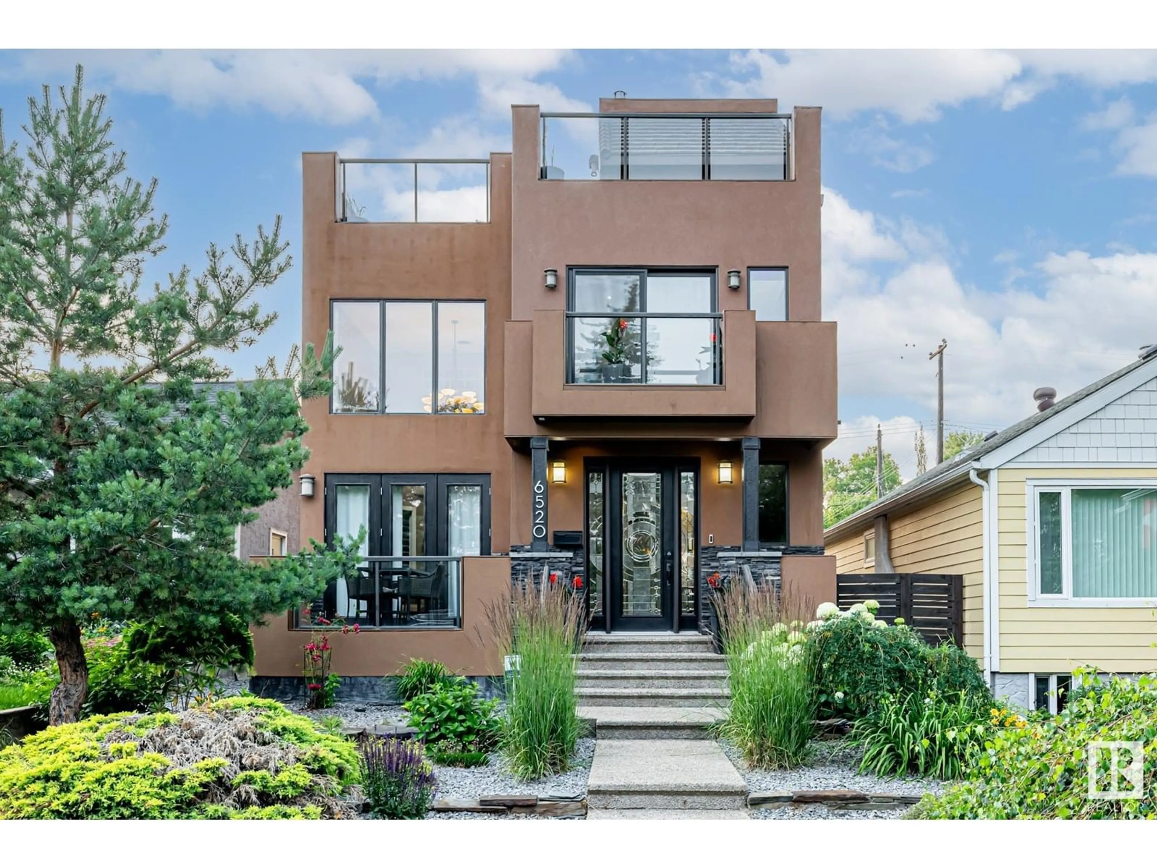 Home with brick exterior material, street for 6520 111 AV, Edmonton Alberta T5W0L8