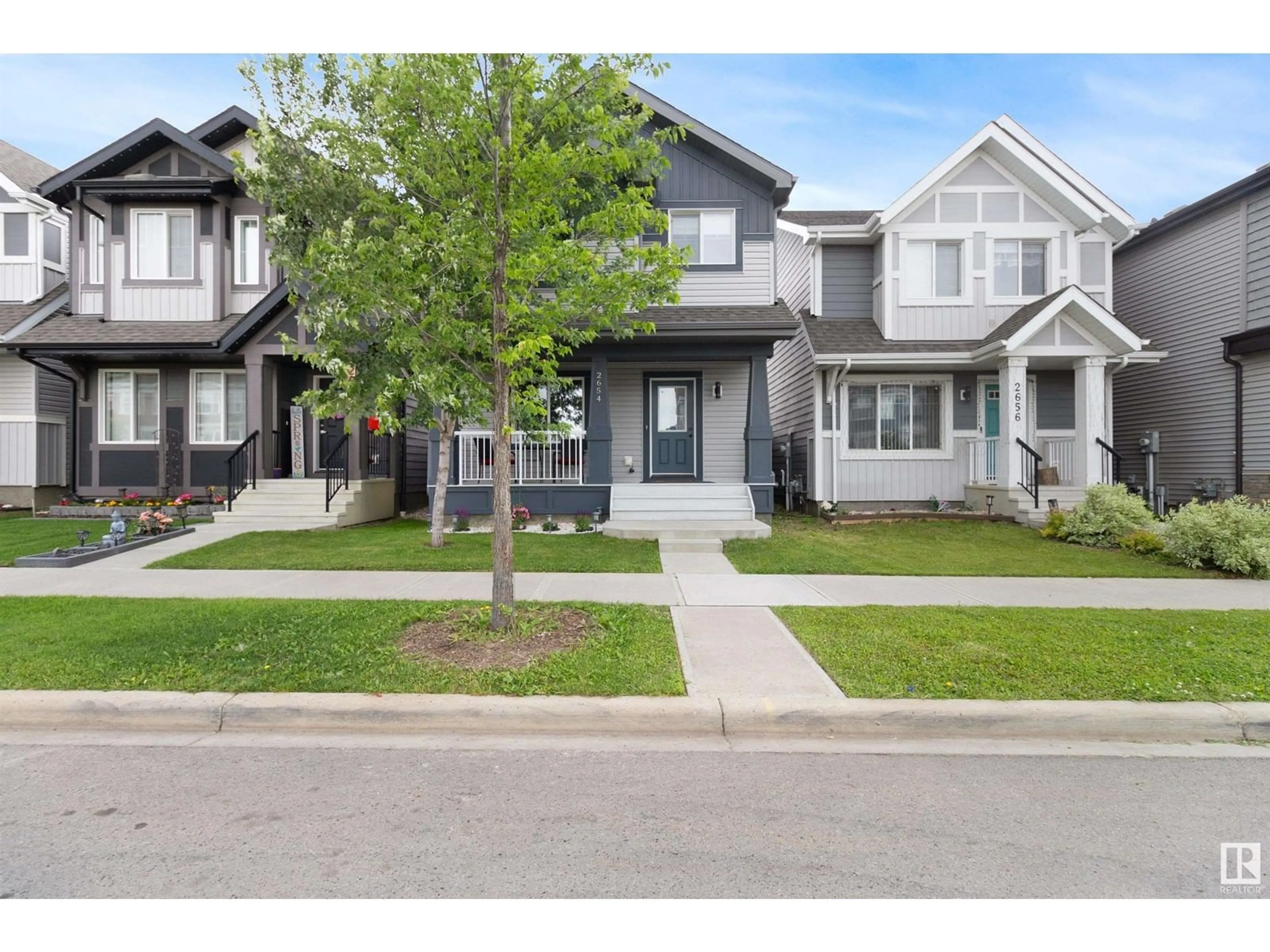 Home with vinyl exterior material, street for 2654 MAPLE WY, Edmonton Alberta T6T2G3
