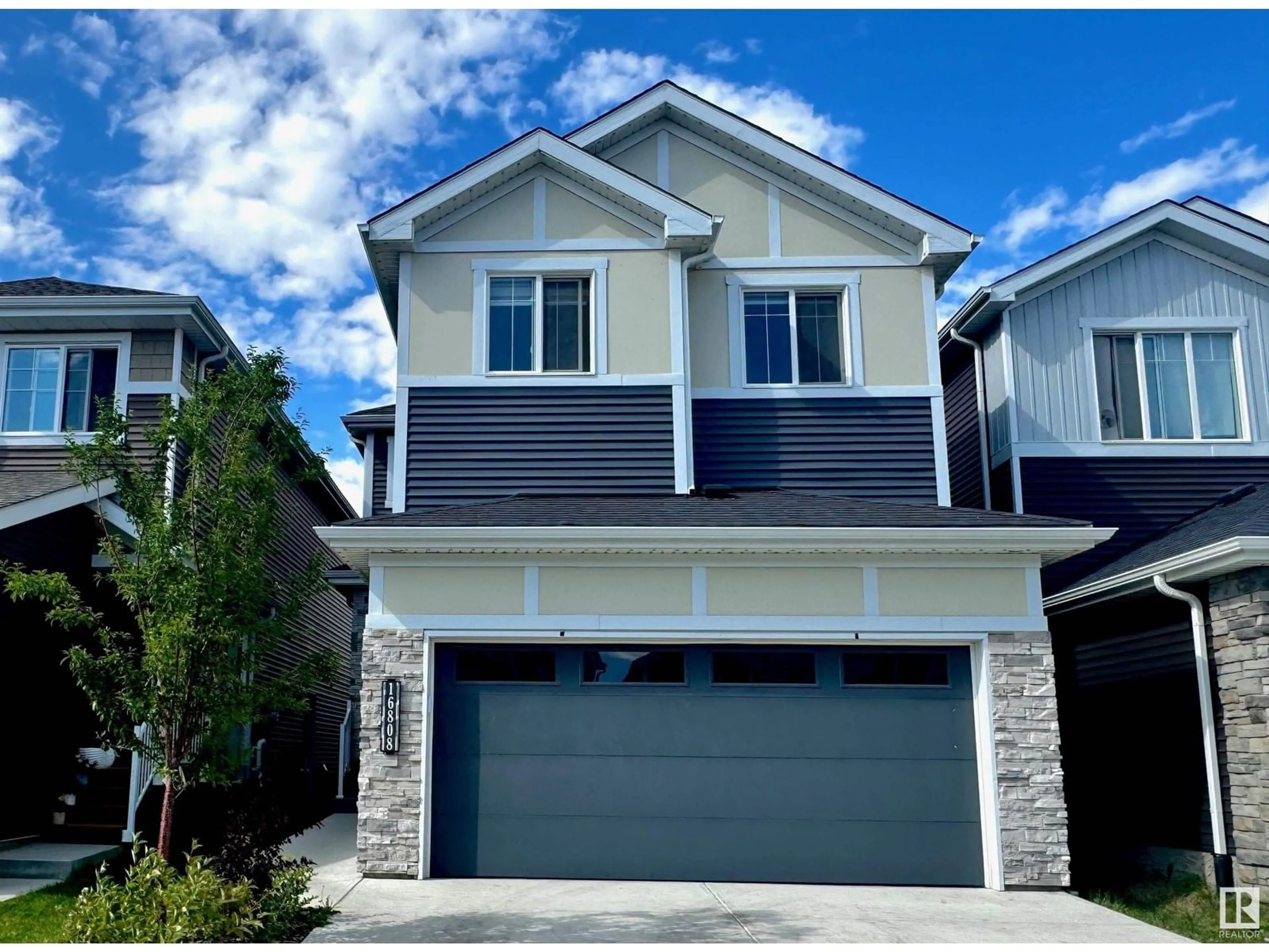 Home with vinyl exterior material, street for SW - 16808 30 AV, Edmonton Alberta T6W5A3