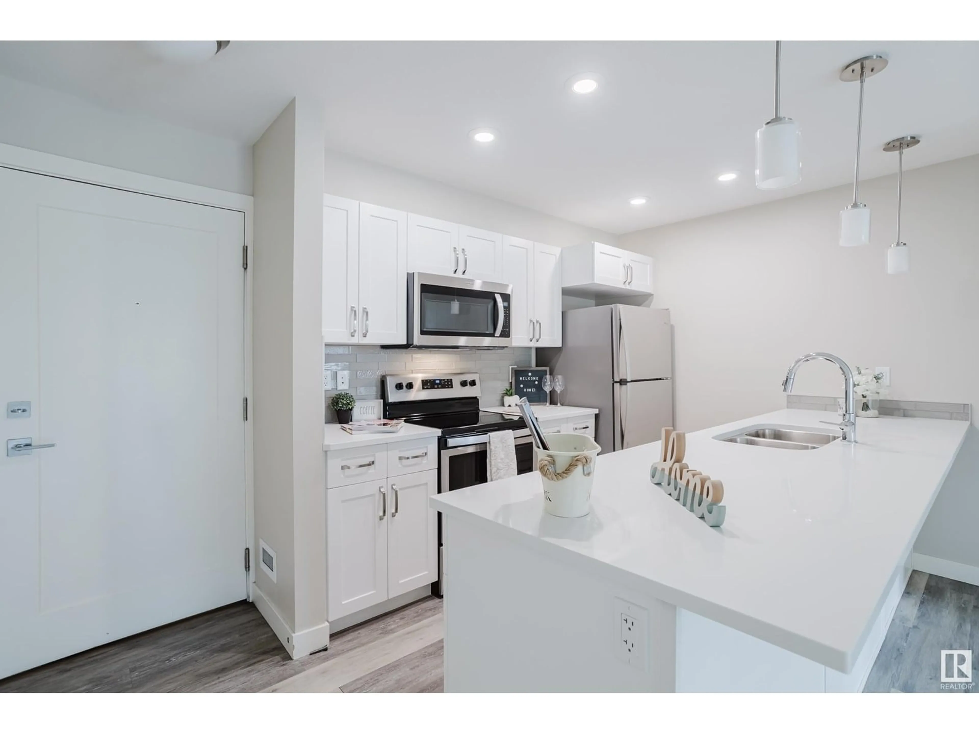 Open concept kitchen, unknown for #209 - 1029 173 ST, Edmonton Alberta T6W3E4