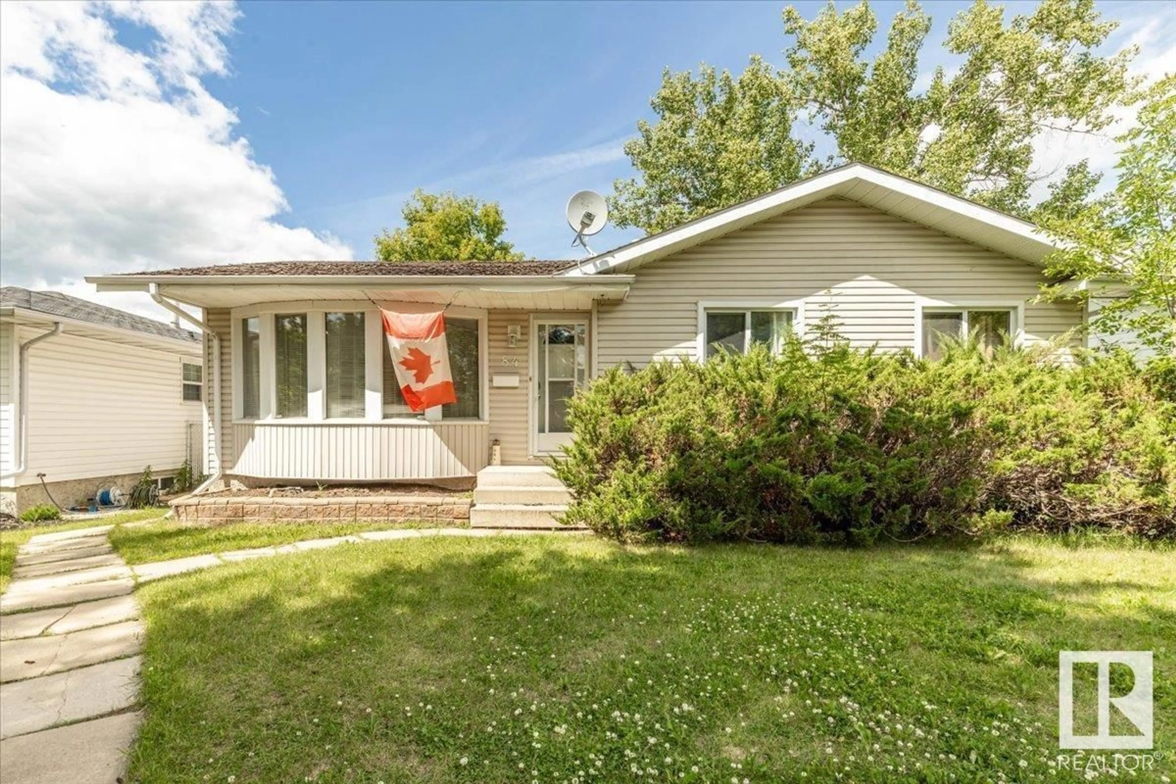 Home with vinyl exterior material, street for 84 BELLA DR, Leduc Alberta T9E4H6
