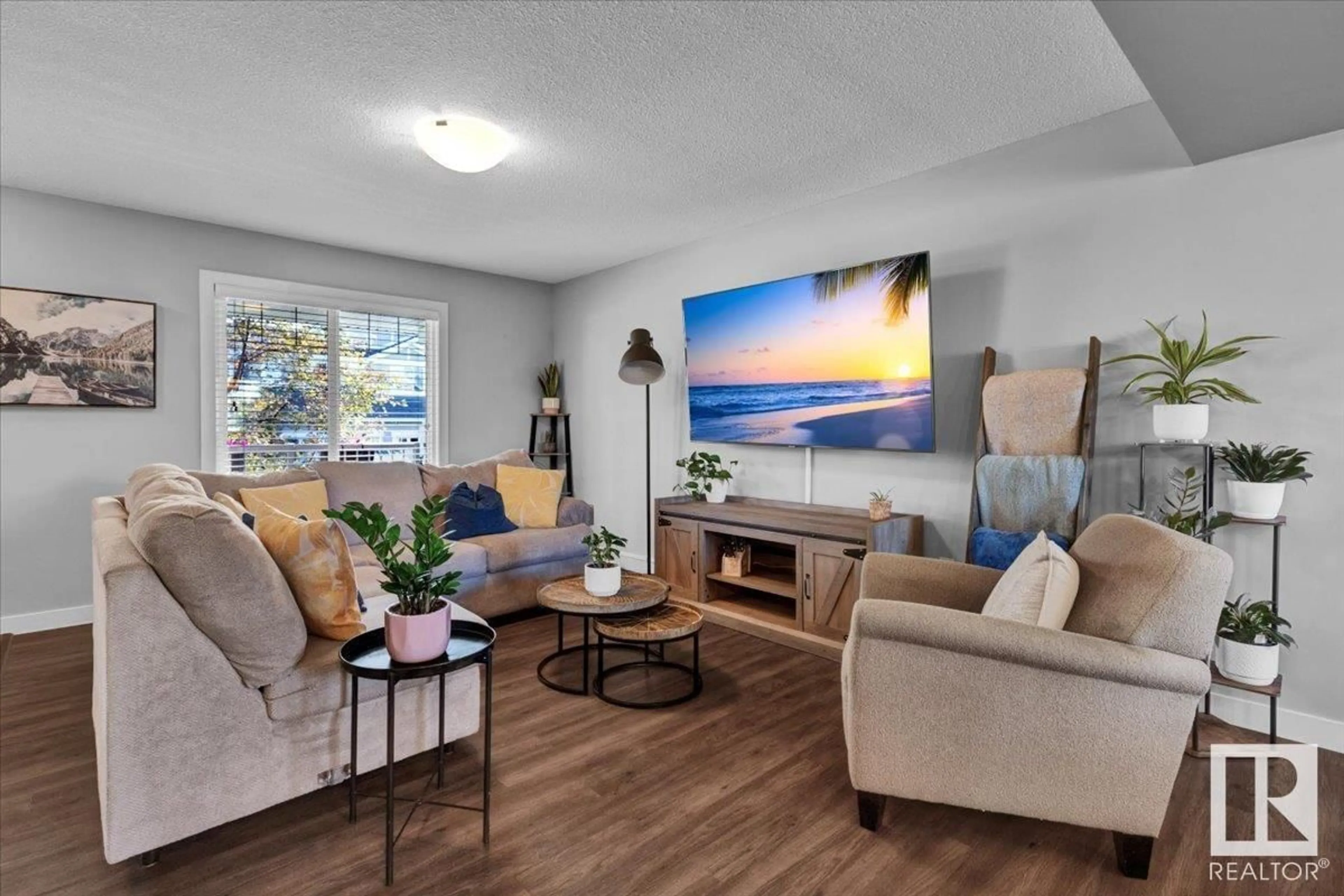 Living room with furniture, unknown for 6810 EVANS WD, Edmonton Alberta T6M0T3
