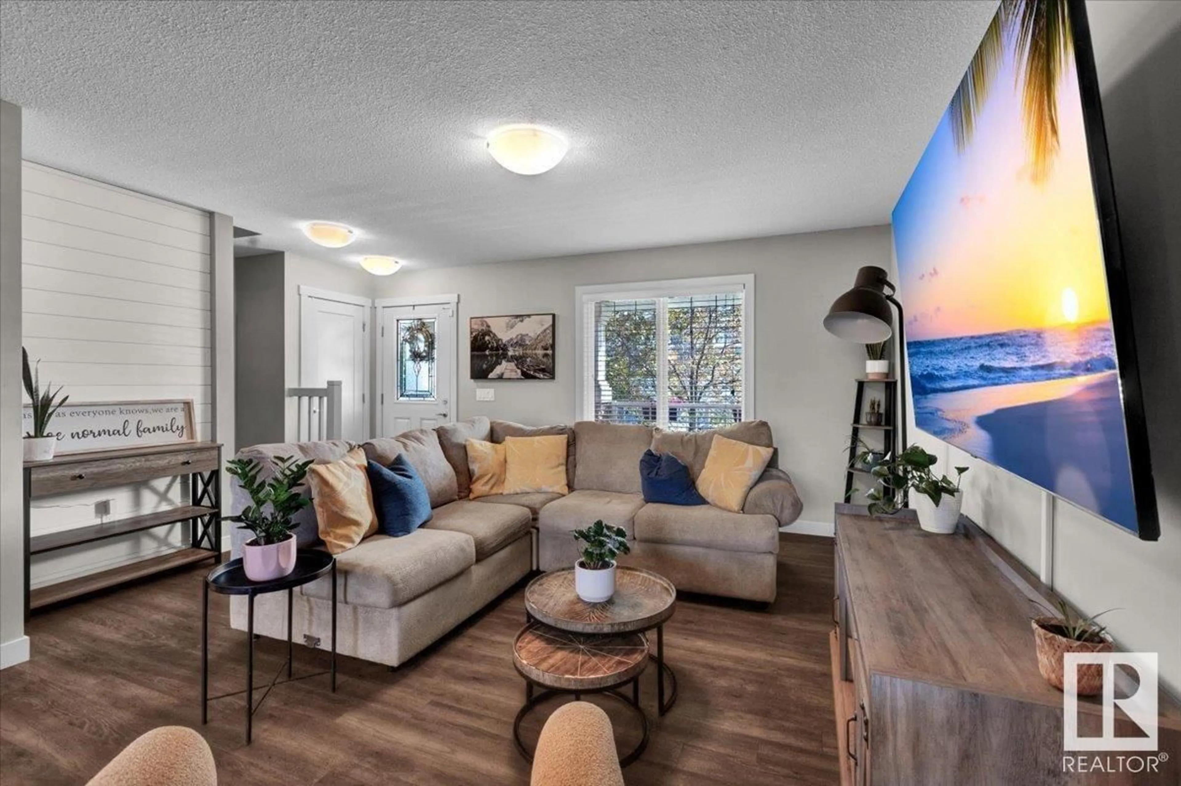 Living room with furniture, unknown for 6810 EVANS WD, Edmonton Alberta T6M0T3