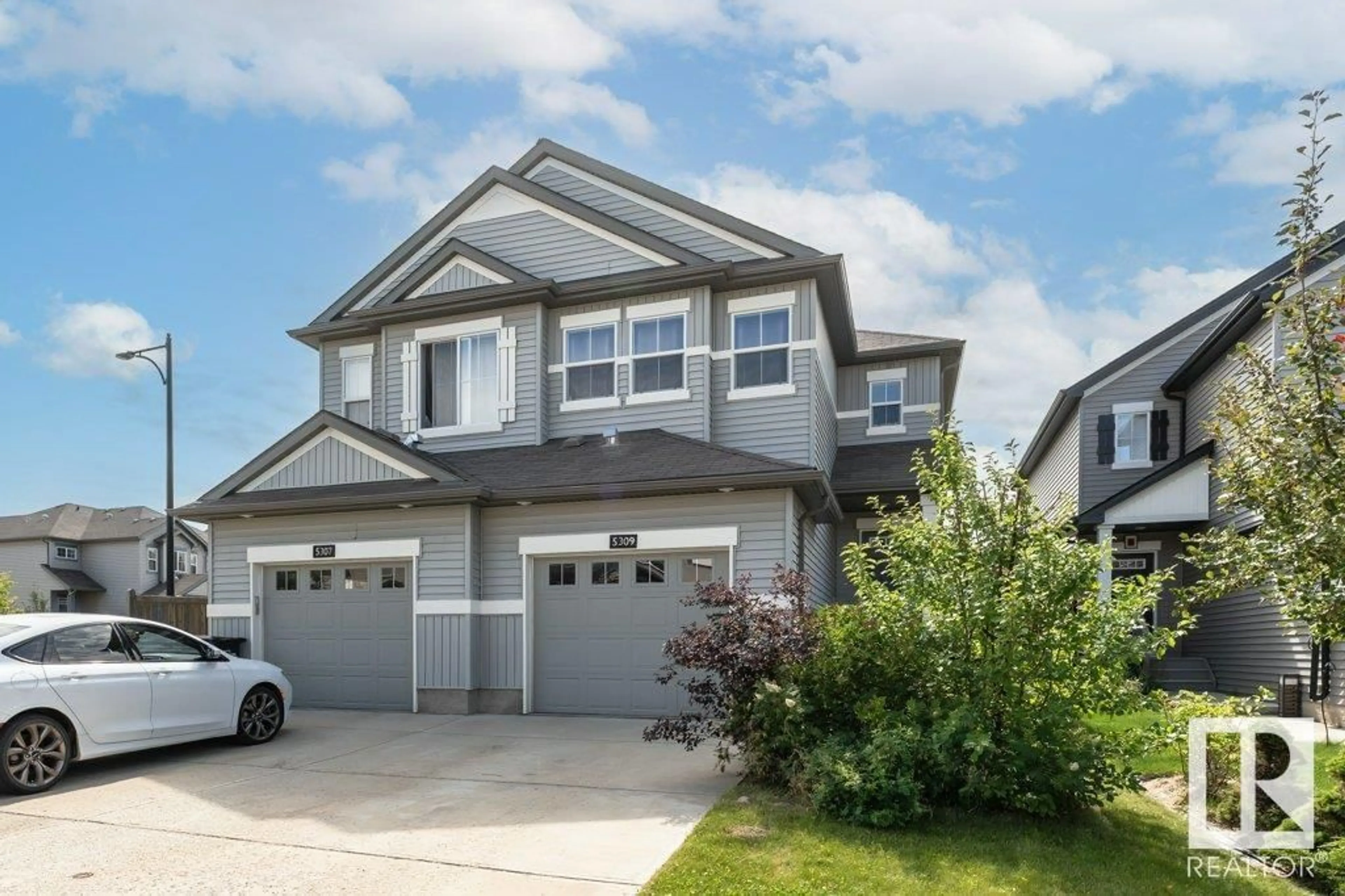 Home with vinyl exterior material, street for 5309 14 AV, Edmonton Alberta T6X1S2