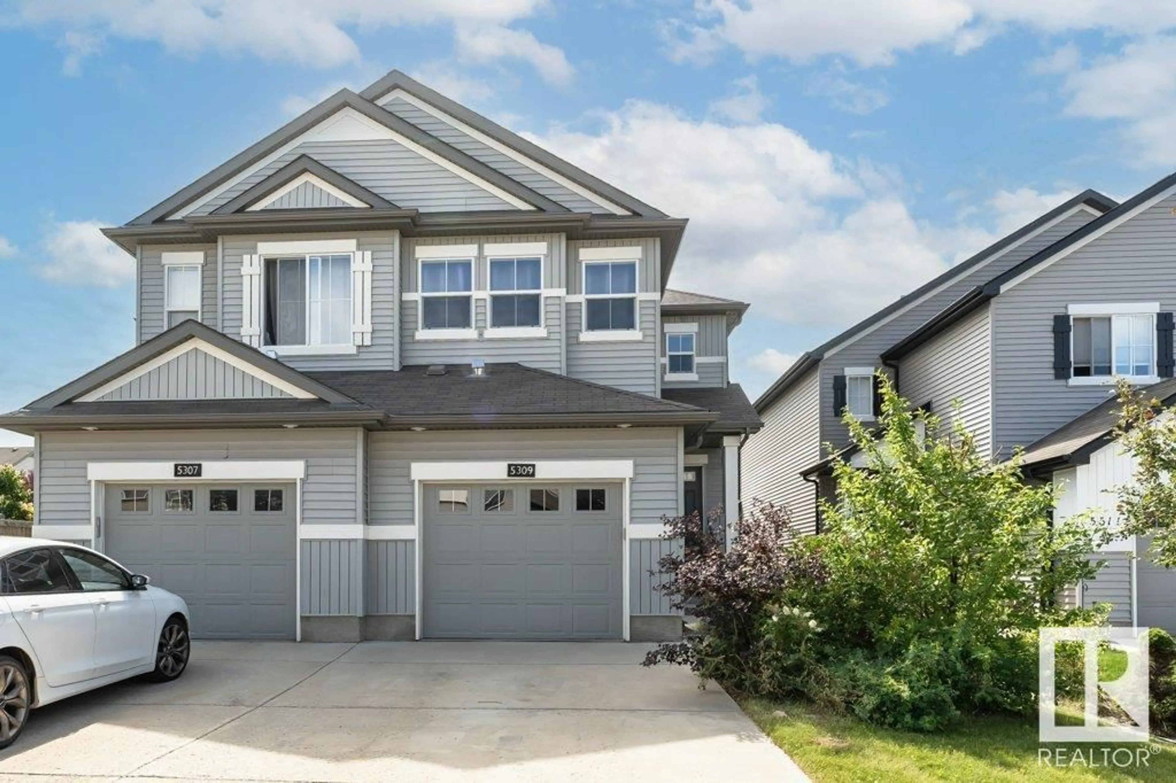 Home with vinyl exterior material, street for 5309 14 AV, Edmonton Alberta T6X1S2