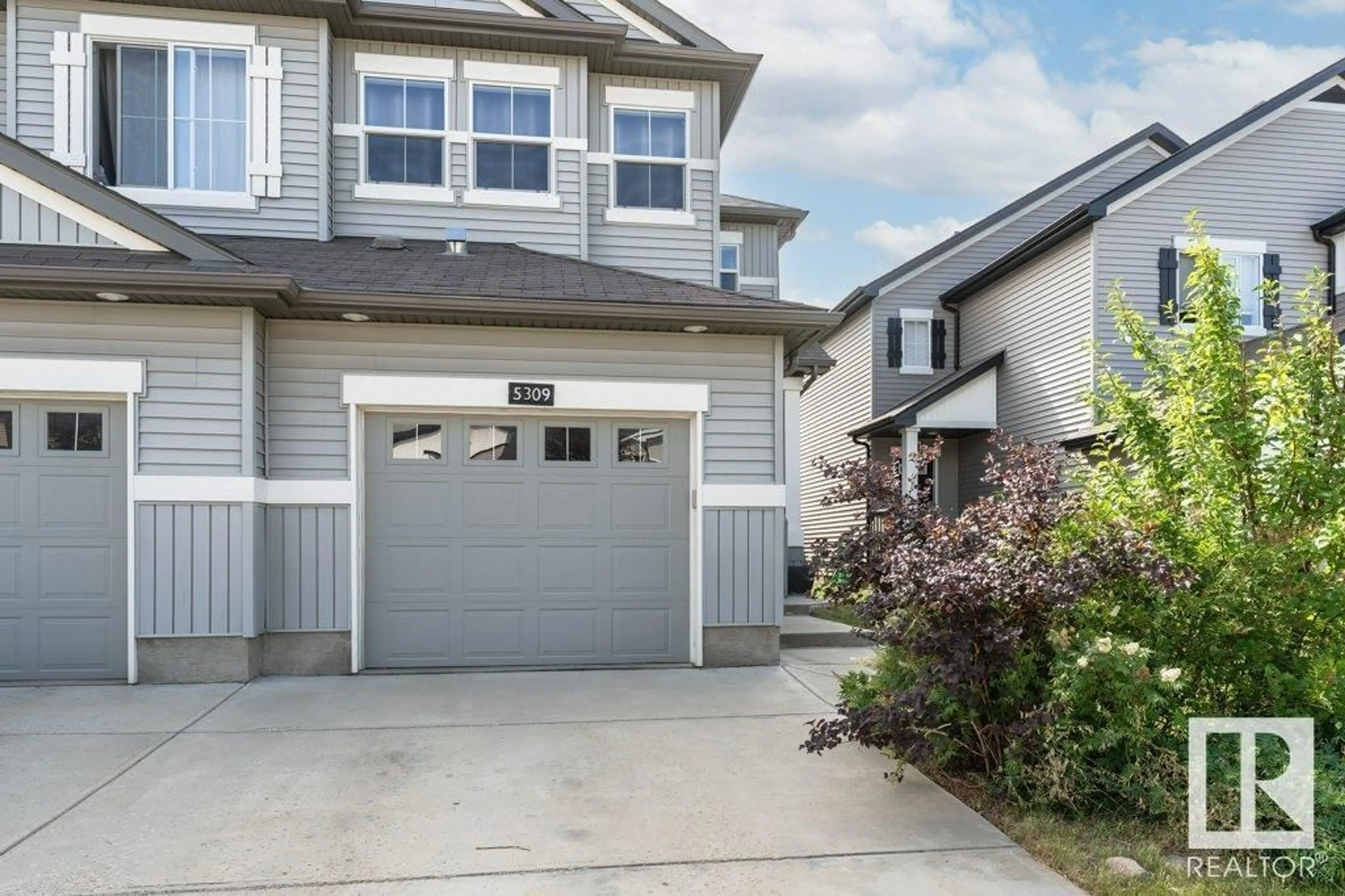 Home with vinyl exterior material, street for 5309 14 AV, Edmonton Alberta T6X1S2