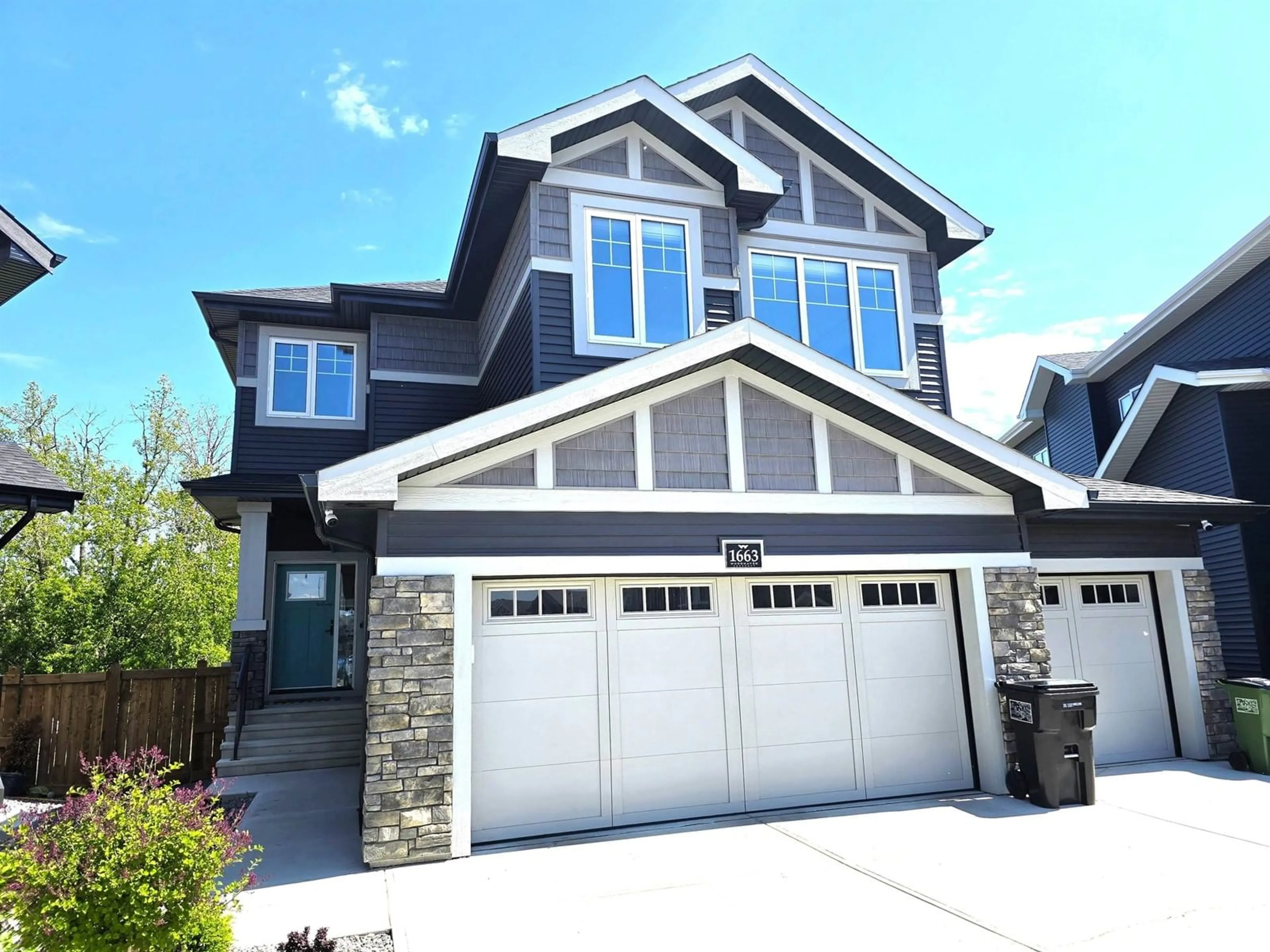 Home with vinyl exterior material, street for 1663 ENRIGHT WY, Edmonton Alberta T6M0Z2
