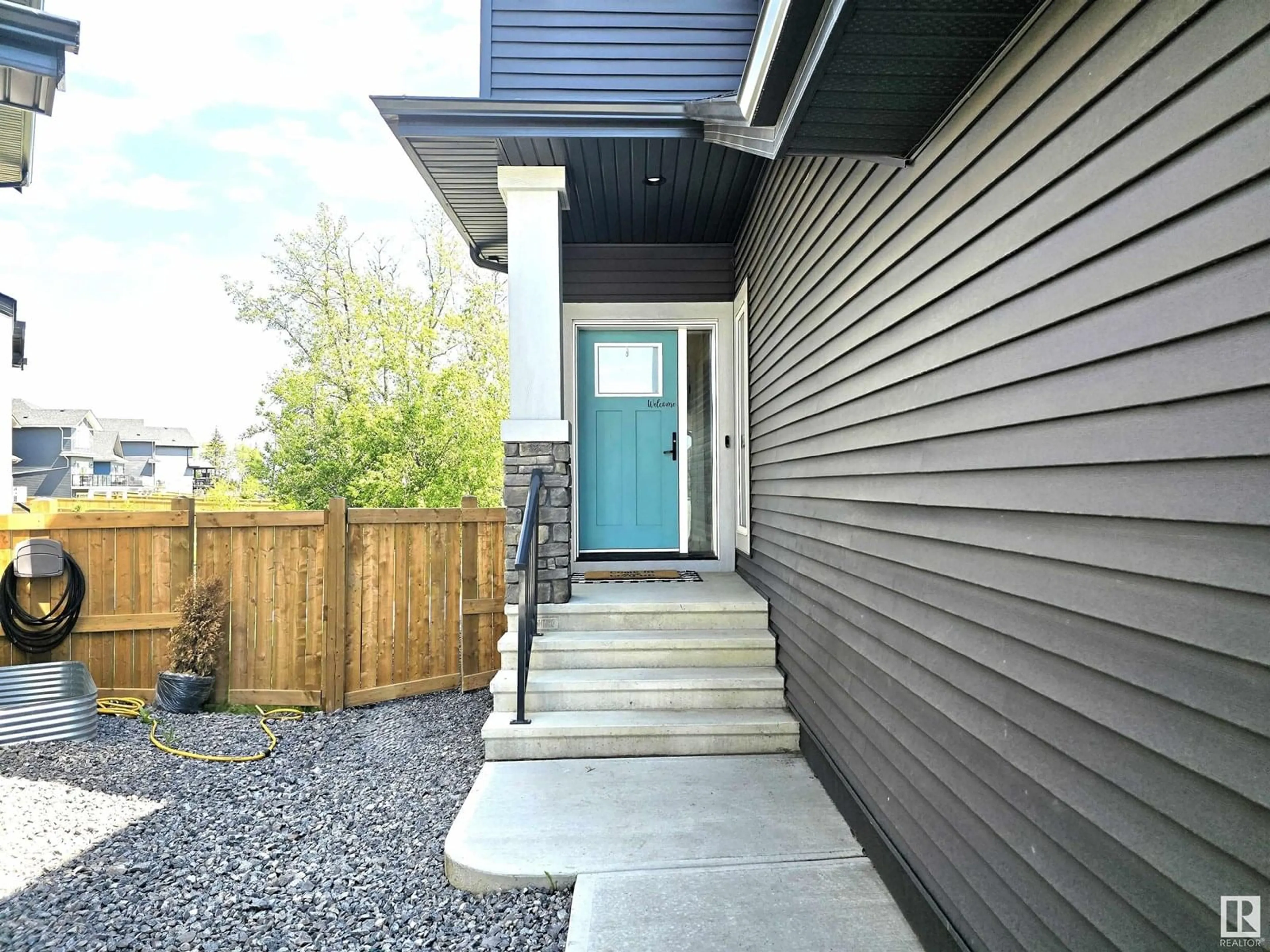 Home with vinyl exterior material, street for 1663 ENRIGHT WY, Edmonton Alberta T6M0Z2