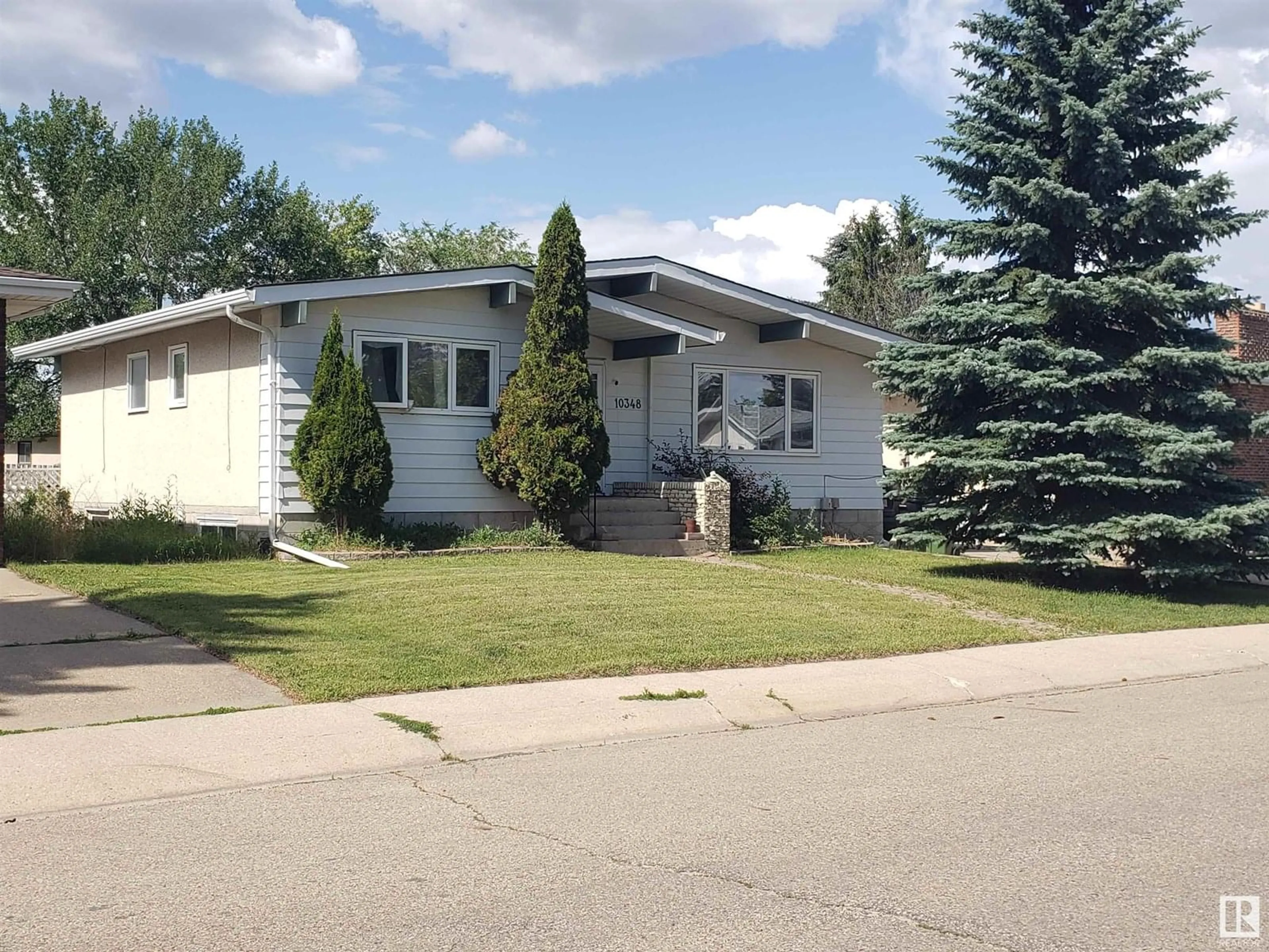 Home with vinyl exterior material, street for 10348 36A AV, Edmonton Alberta T6J2H6
