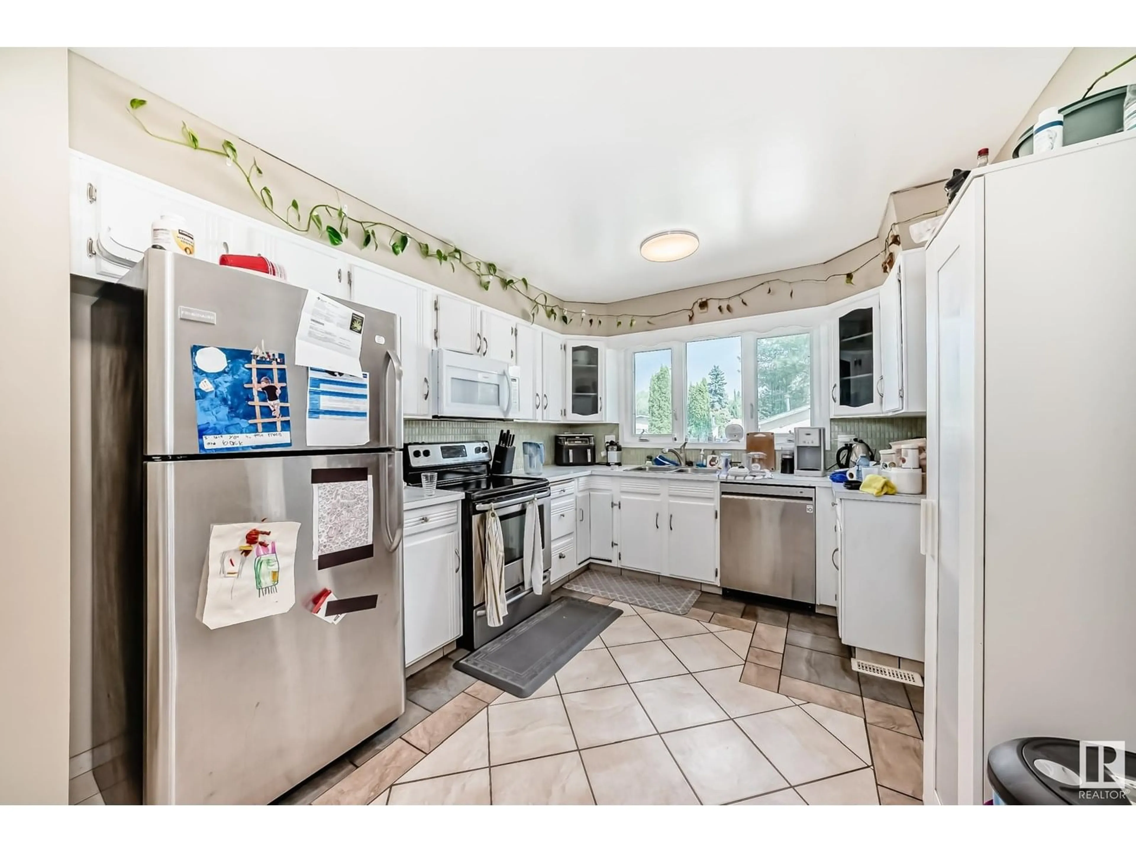 Standard kitchen, ceramic/tile floor for 10348 36A AV, Edmonton Alberta T6J2H6
