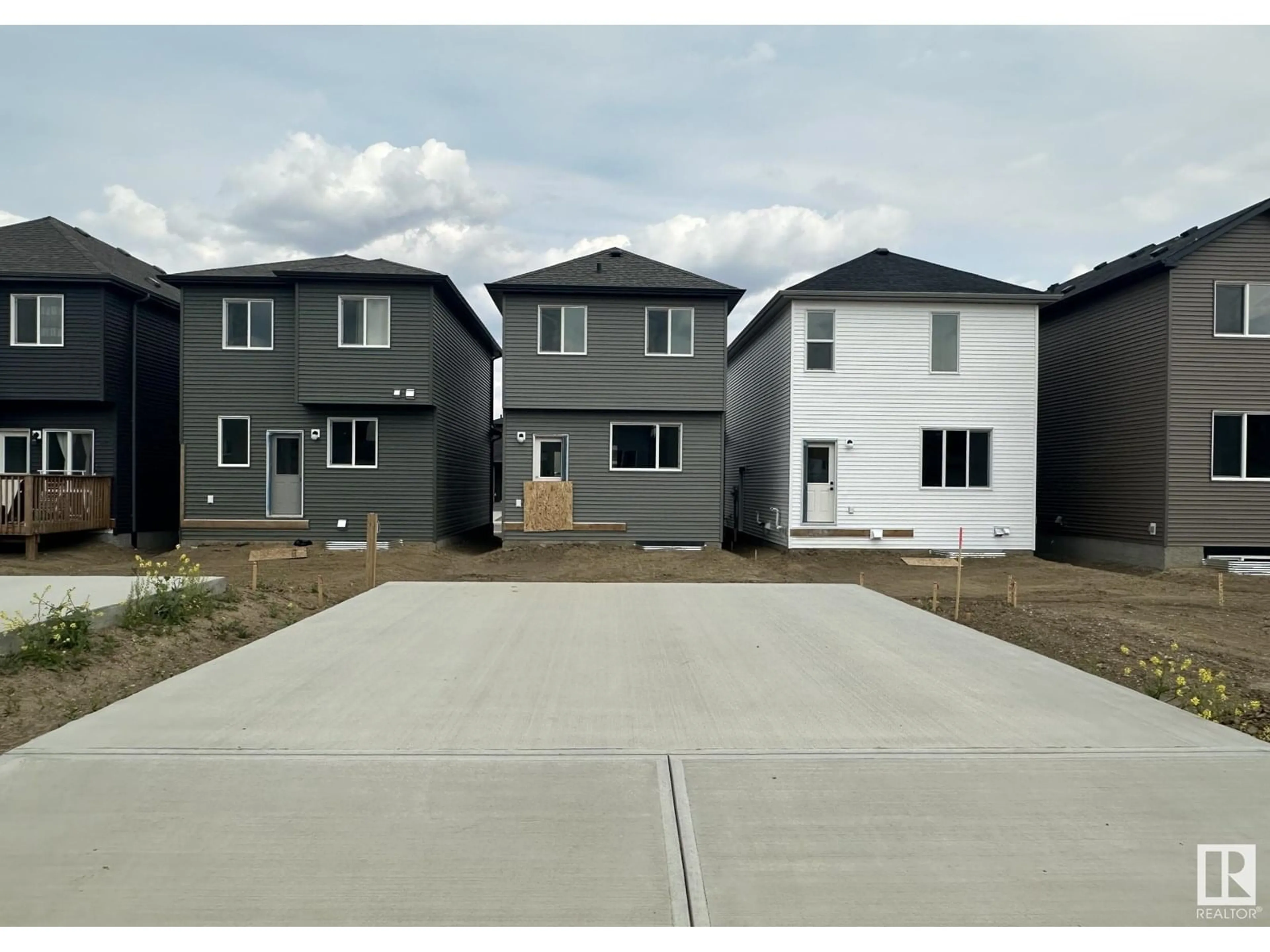 Home with vinyl exterior material, street for NW - 9348 221 ST, Edmonton Alberta T5T6C9