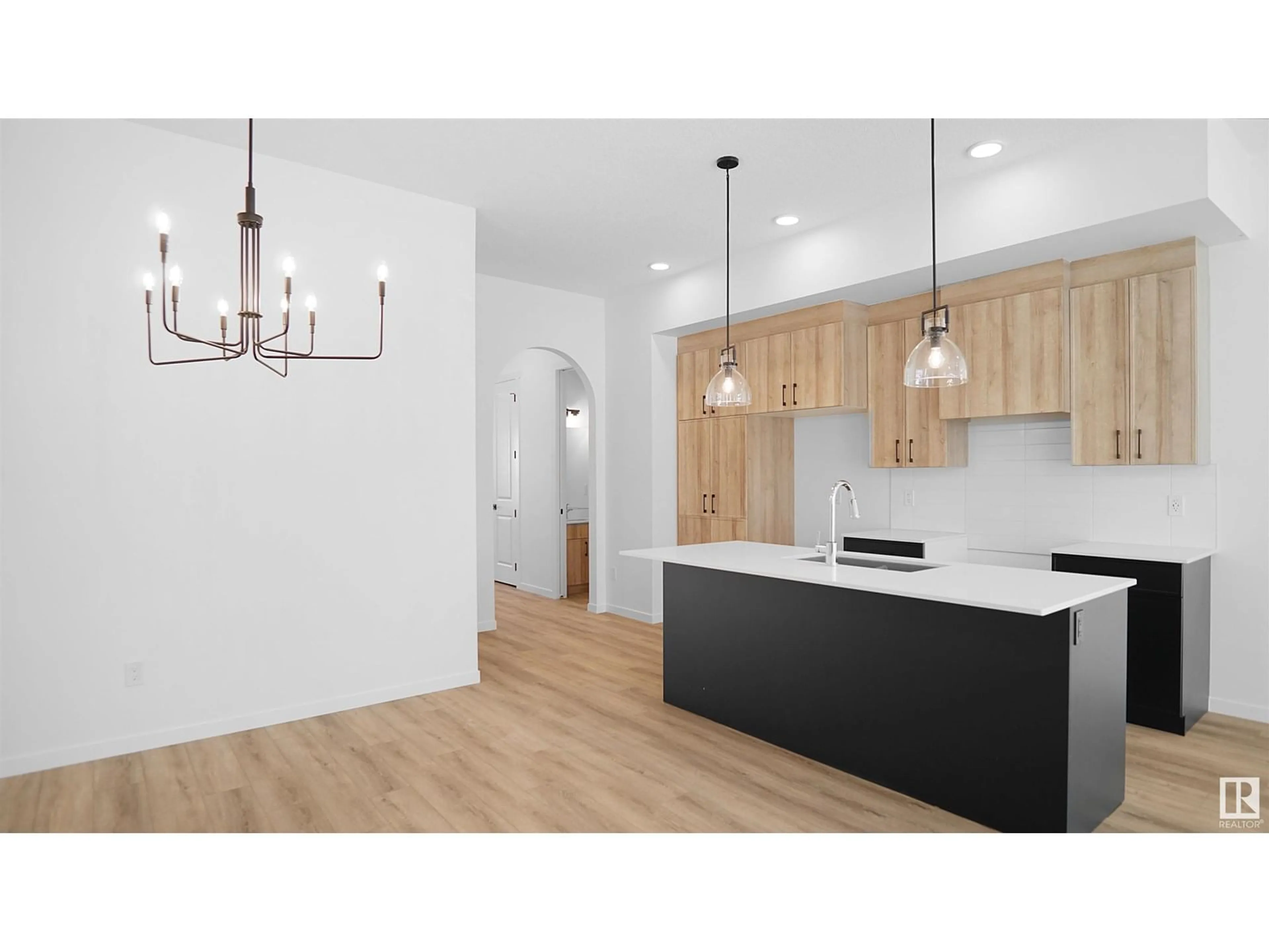 Open concept kitchen, wood/laminate floor for 7505 OBSERVER LN, Edmonton Alberta T5G2S5