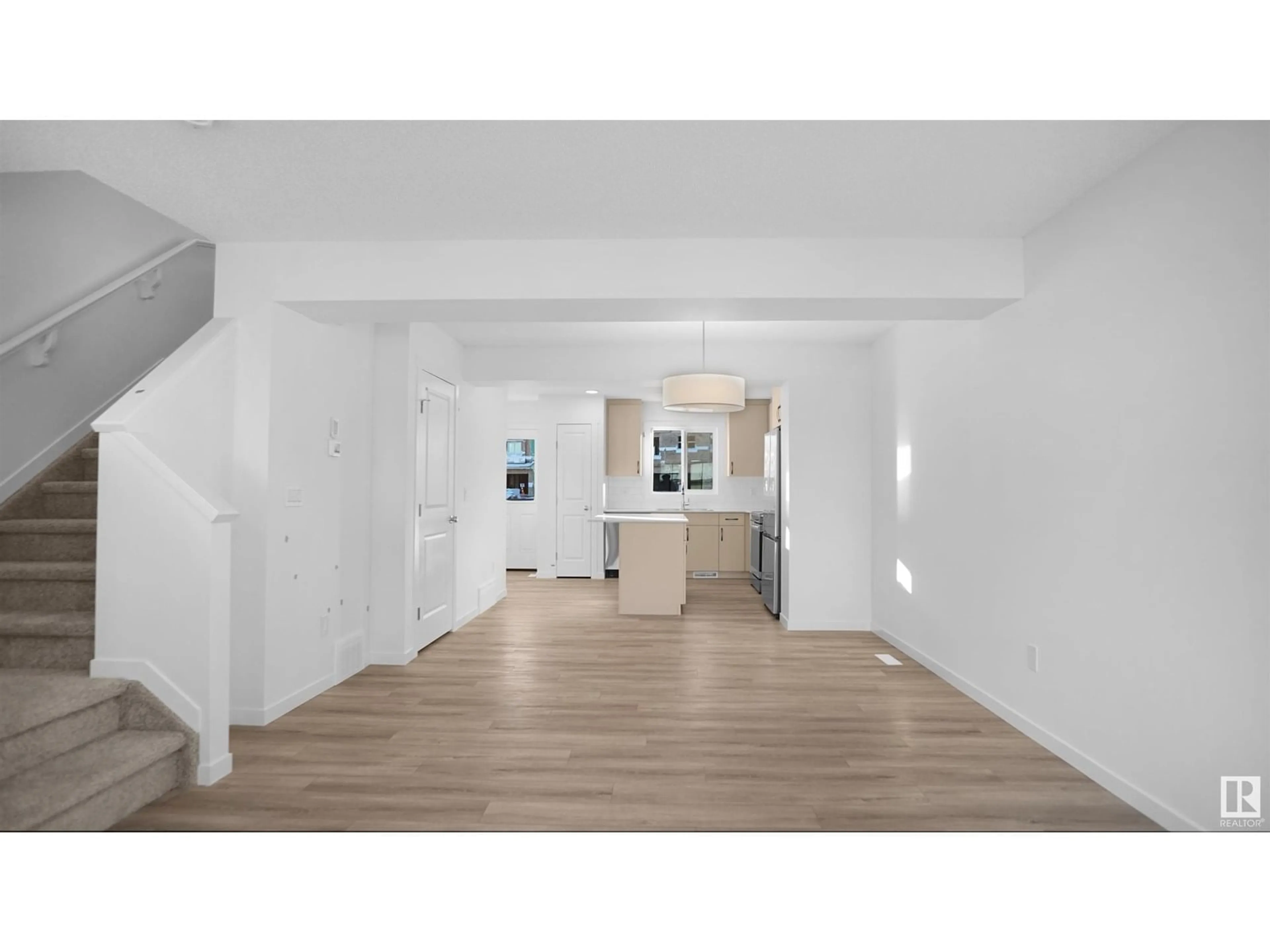Open concept kitchen, wood/laminate floor for 90 - 3705 141 ST, Edmonton Alberta T6W3J2