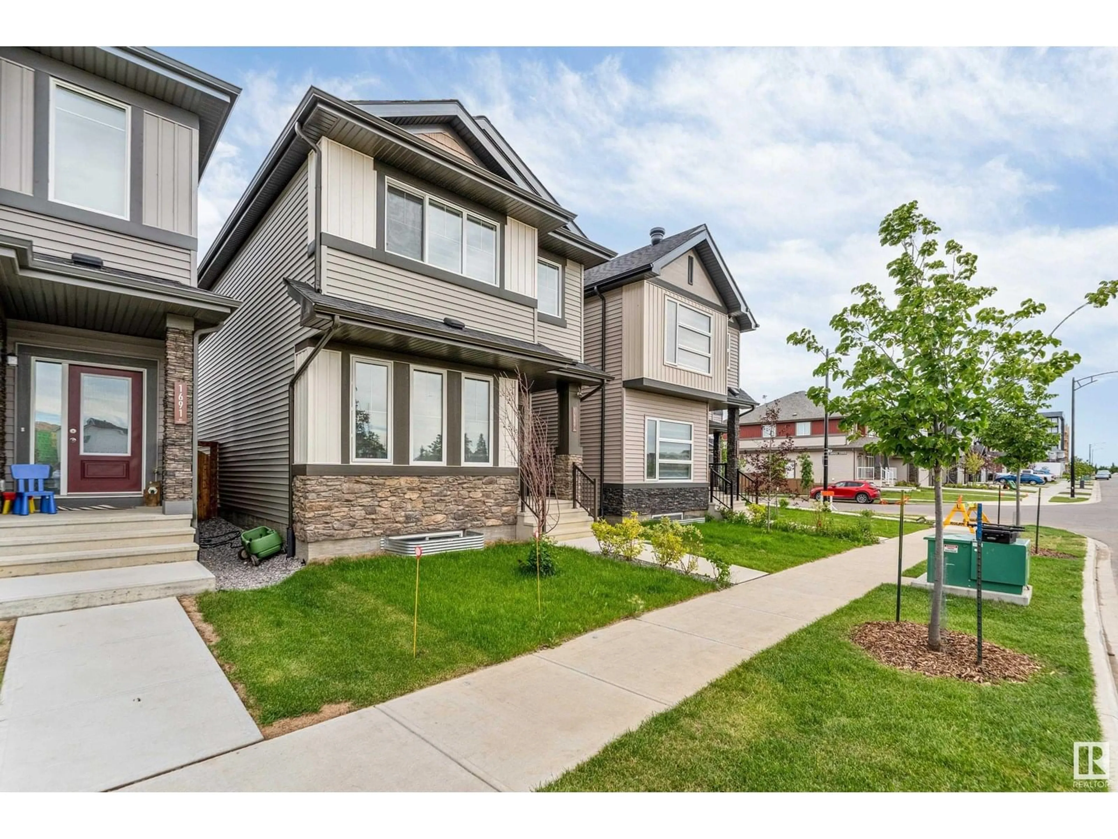 Home with brick exterior material, street for 1689 CAVANAGH BV, Edmonton Alberta T6W4S6