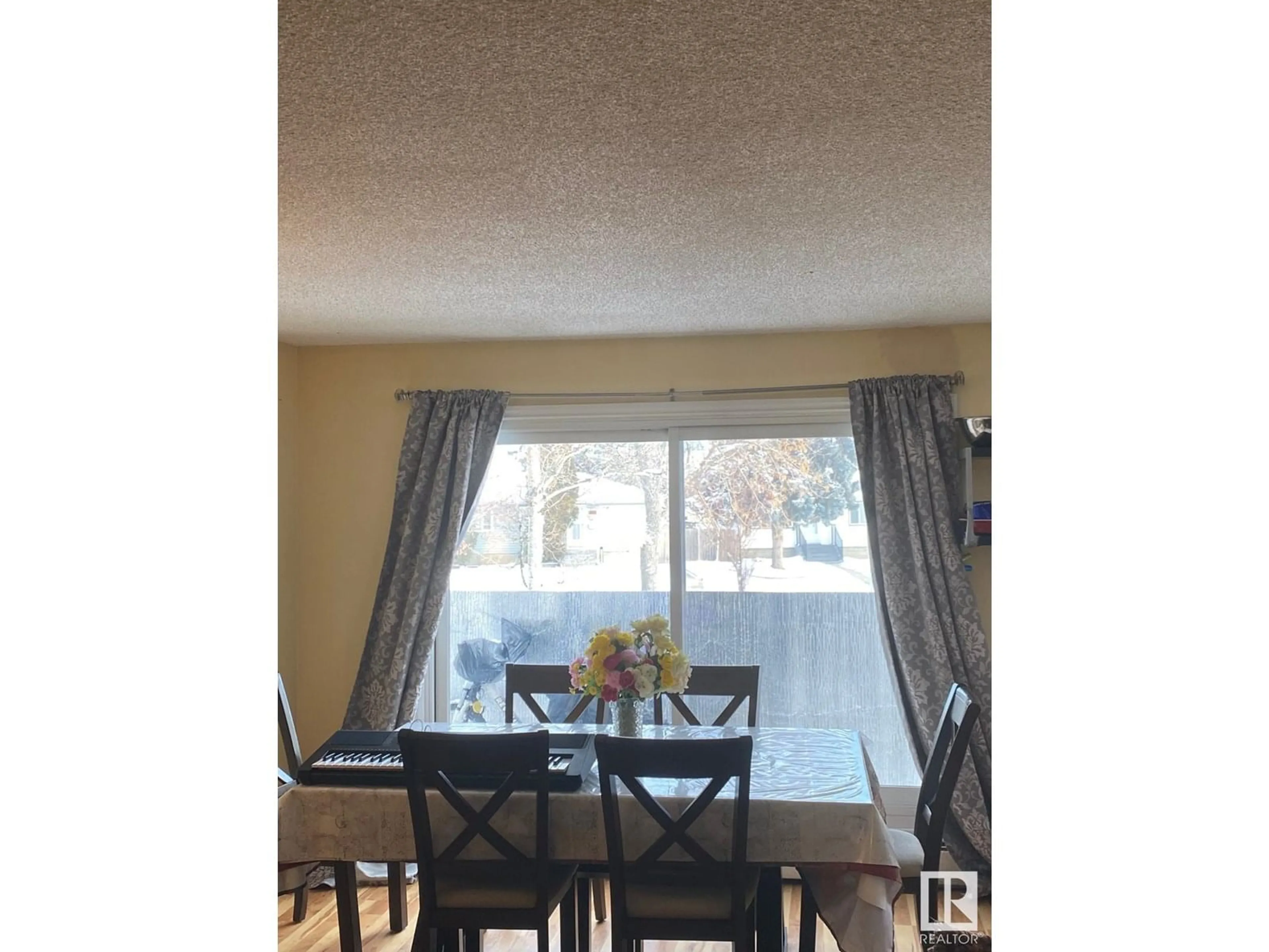 Dining room, wood/laminate floor for 207 - 8930 149 ST, Edmonton Alberta T5R1B8