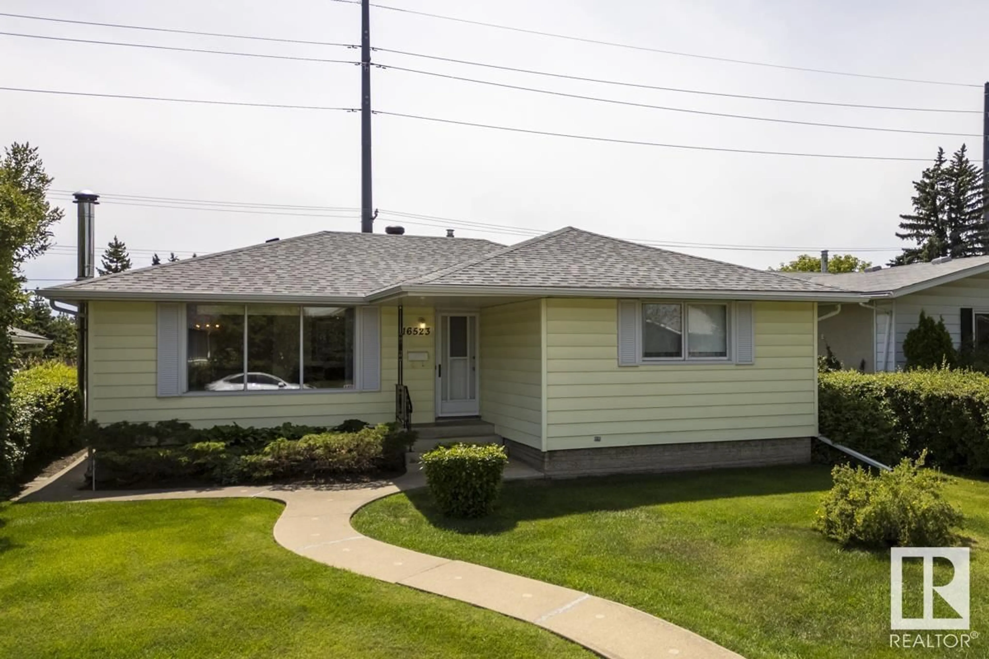 Home with vinyl exterior material, street for 16523 79A AV, Edmonton Alberta T5R3J2