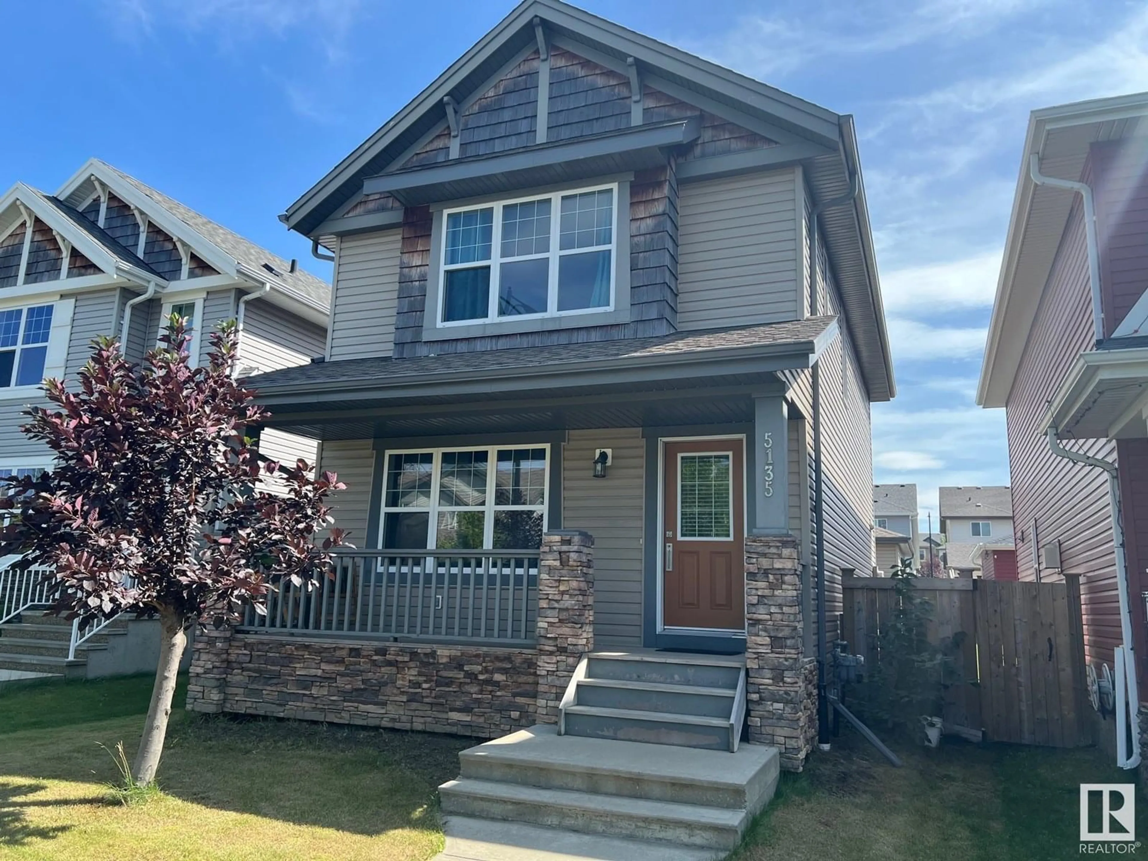 Home with vinyl exterior material, street for SW - 5135 1A AV, Edmonton Alberta T5X0X3